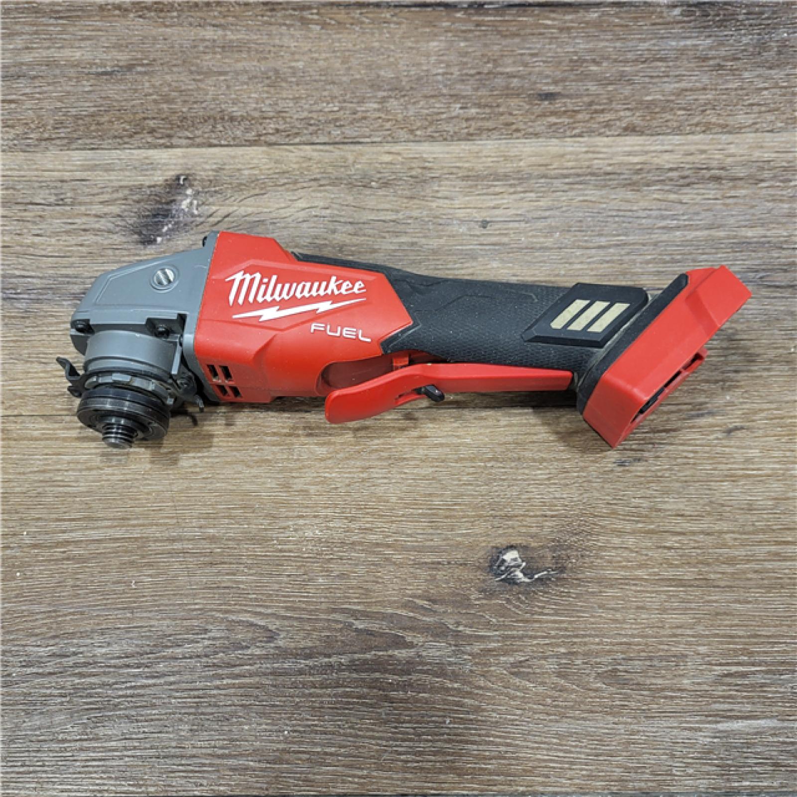 AS-IS Milwaukee 2880-20 M18 FUEL 18-Volt Lithium-Ion Brushless Cordless 4-1/2 in./5 in. Grinder W/Paddle Switch (Tool-Only)