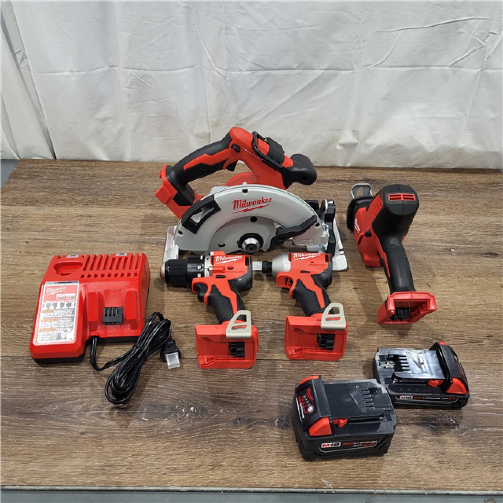 AS-IS M18 18-Volt Lithium-Ion Brushless Cordless Combo Kit (4-Tool) with 2-Batteries, 1-Charger and Tool Bag