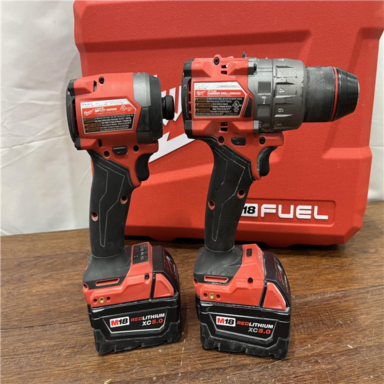 AS-ISMilwaukee M18 FUEL 18V Lithium-Ion Brushless Cordless Hammer Drill and Impact Driver Combo Kit (2-Tool) with 2 Batteries