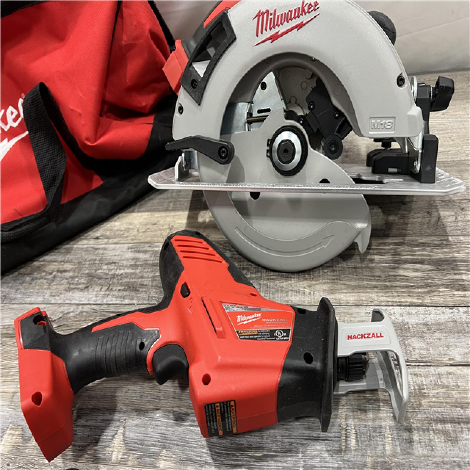 AS-IS MILWAUKEE M18 18-Volt Lithium-Ion Brushless Cordless Combo Kit (4-Tool) with 2-Batteries, 1-Charger and Tool Bag