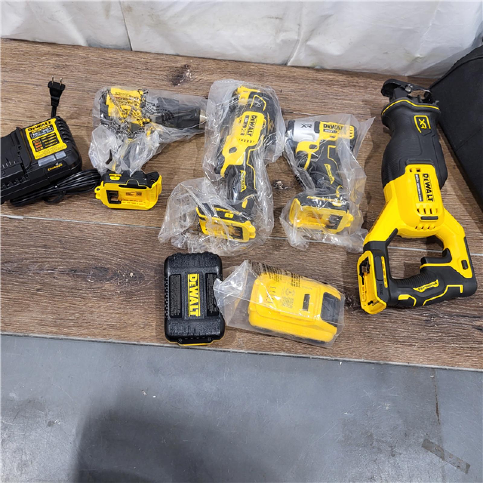 New AS-IS DEWALT 20-Volt Maximum Lithium-Ion Cordless 4-Tool Combo Kit with (2) 4 Ah Batteries and Charger