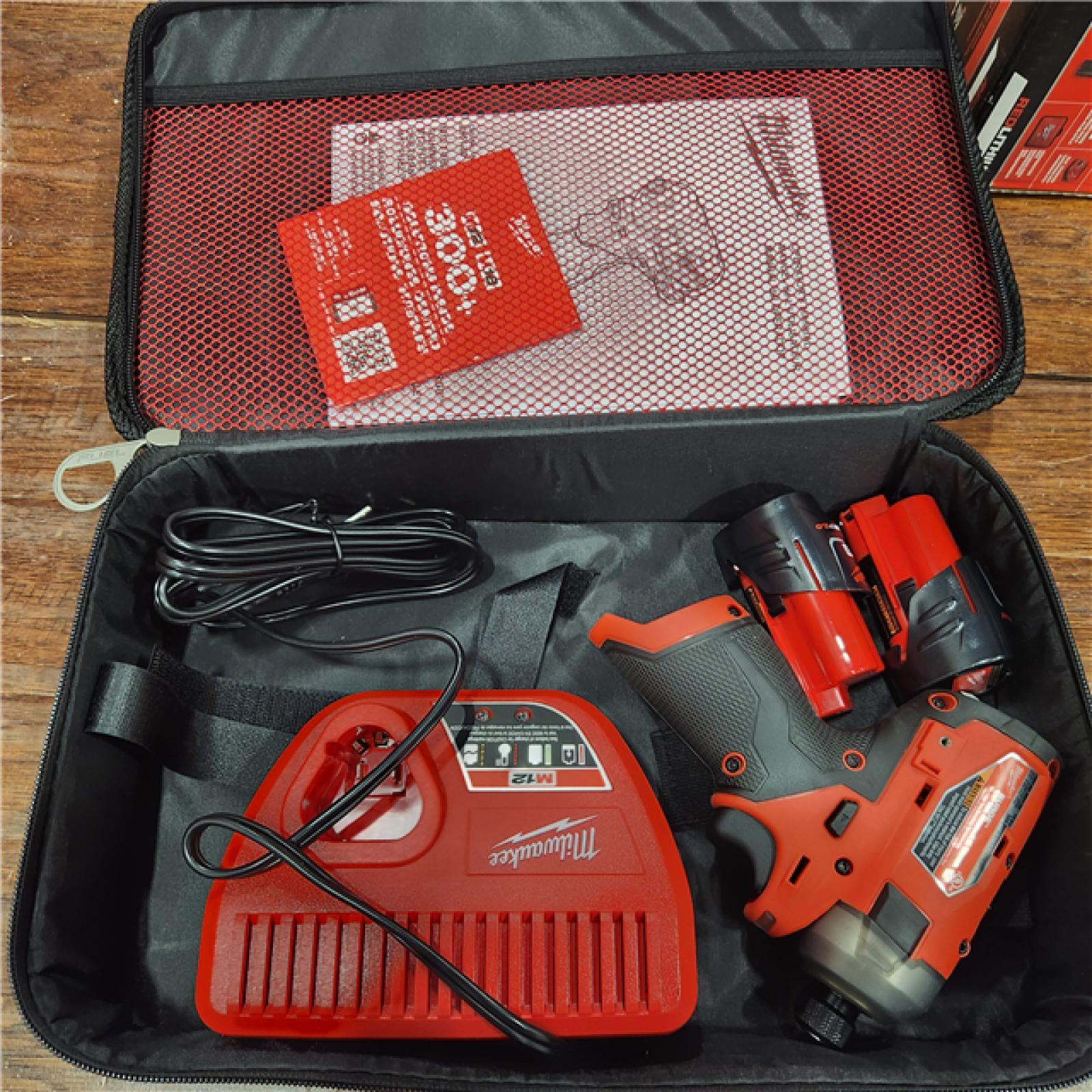 AS-IS M12 FUEL SURGE 12V Lithium-Ion Brushless Cordless 1/4 in. Hex Impact Driver Compact Kit W/Two 2.0Ah Batteries, Bag