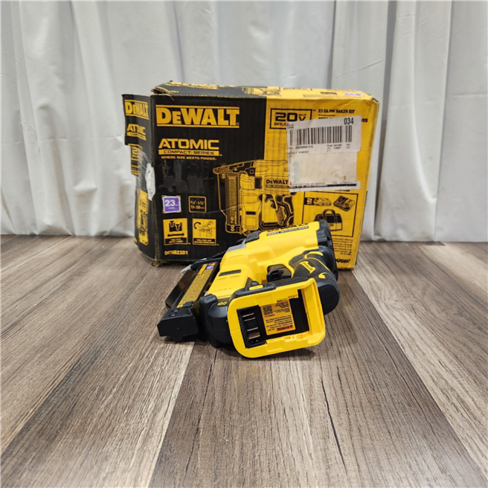 AS IS DEWALT ATOMIC 20V MAX Lithium Ion Cordless 23 Gauge Pin Nailer Kit with 3.0Ah Battery and Charger