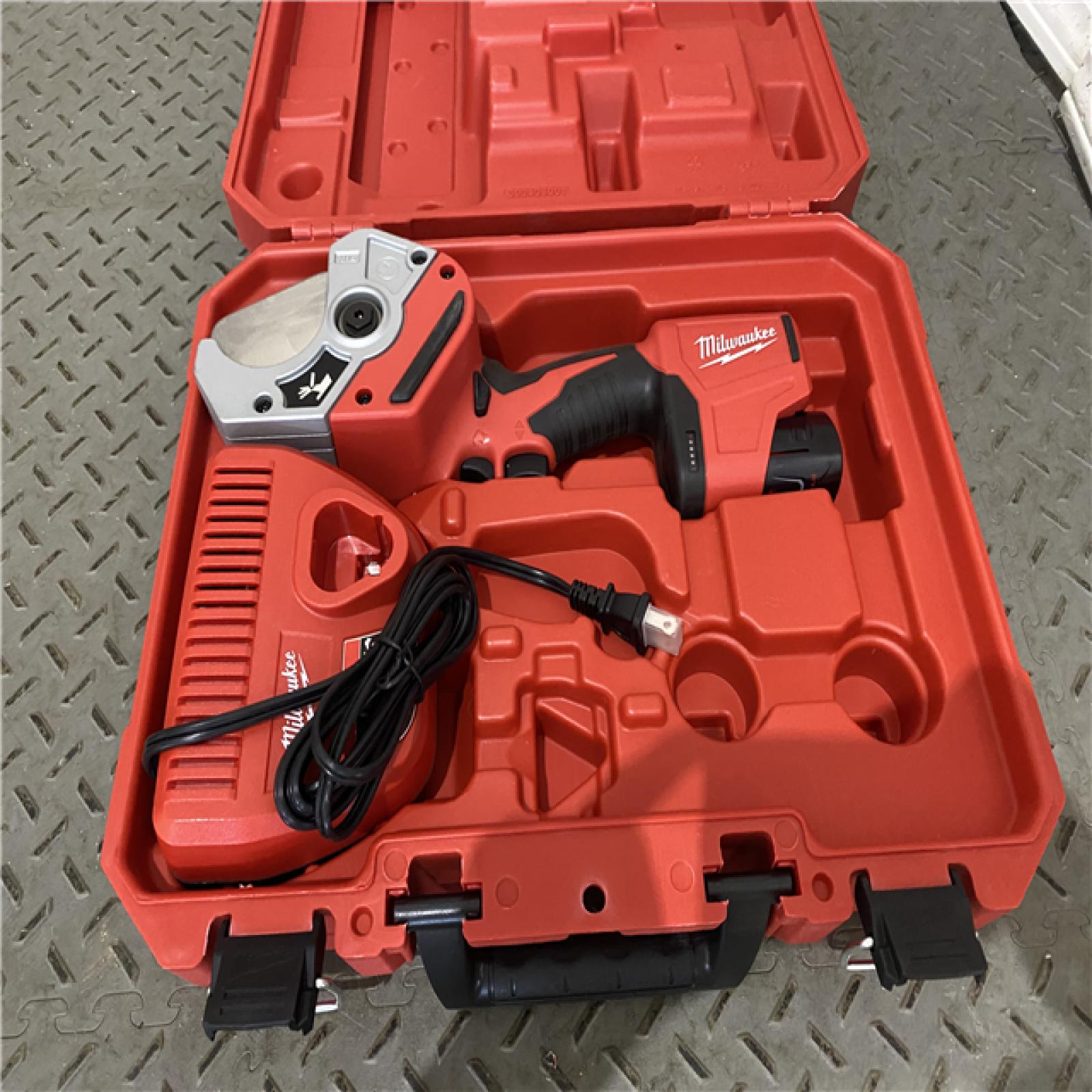 Houston location AS-IS Milwaukee M12 12V Plastic Pipe Shear Kit 2470-21 with 1.5Ah Battery  Charger  & Tool Case