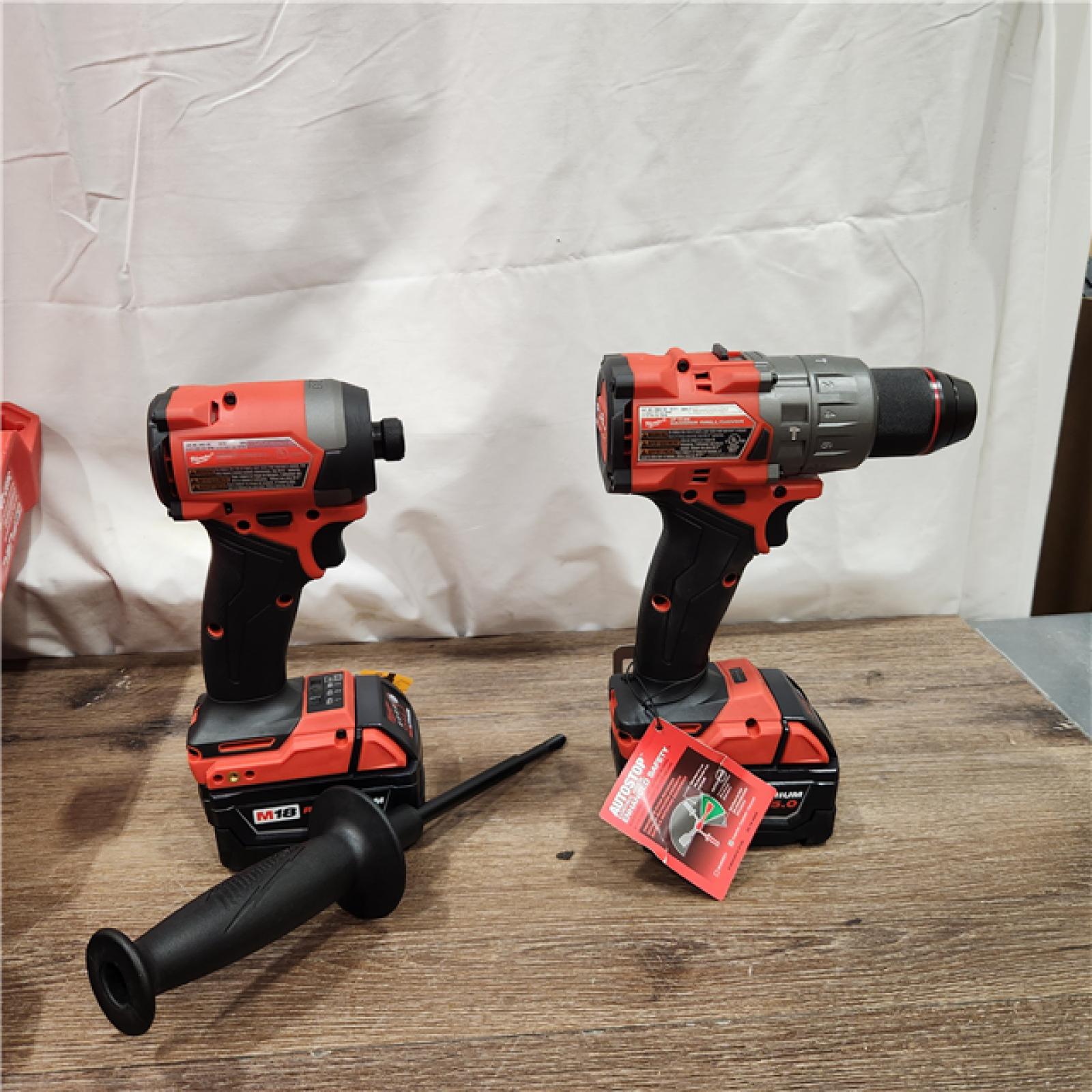 AS-IS Milwaukee 2697-22 M18 18-Volt 1/2-Inch 2-Tool Combo Kit Includes Charger, Battery (2) and Bag