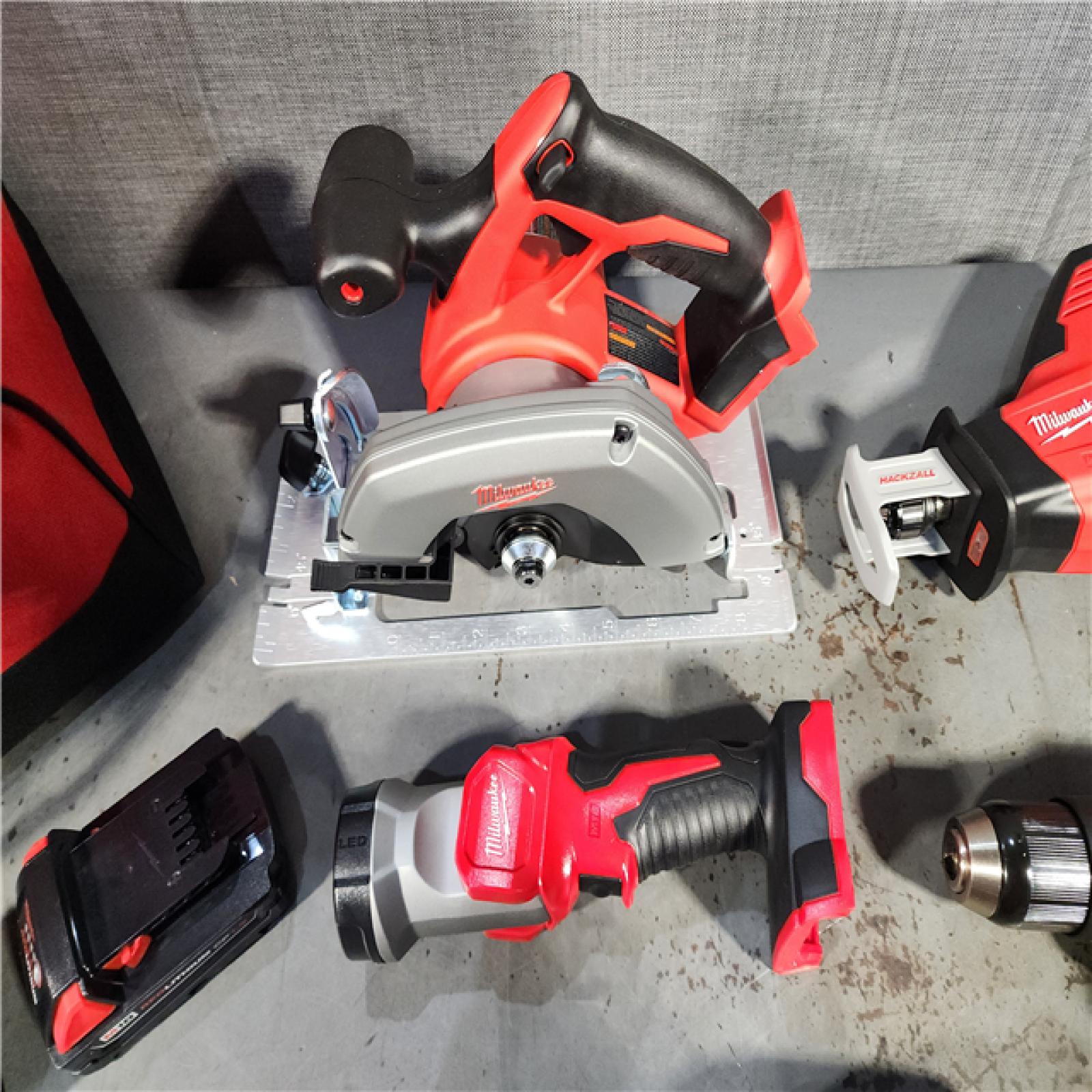 HOUSTON LOCATION - AS-IS (APPEARS LIKE NEW) M18 18V Lithium-Ion Cordless Combo Kit (5-Tool) with (1) 3.0Ah and (1) 1.5Ah Battery, (1) Charger, (1) Tool Bag