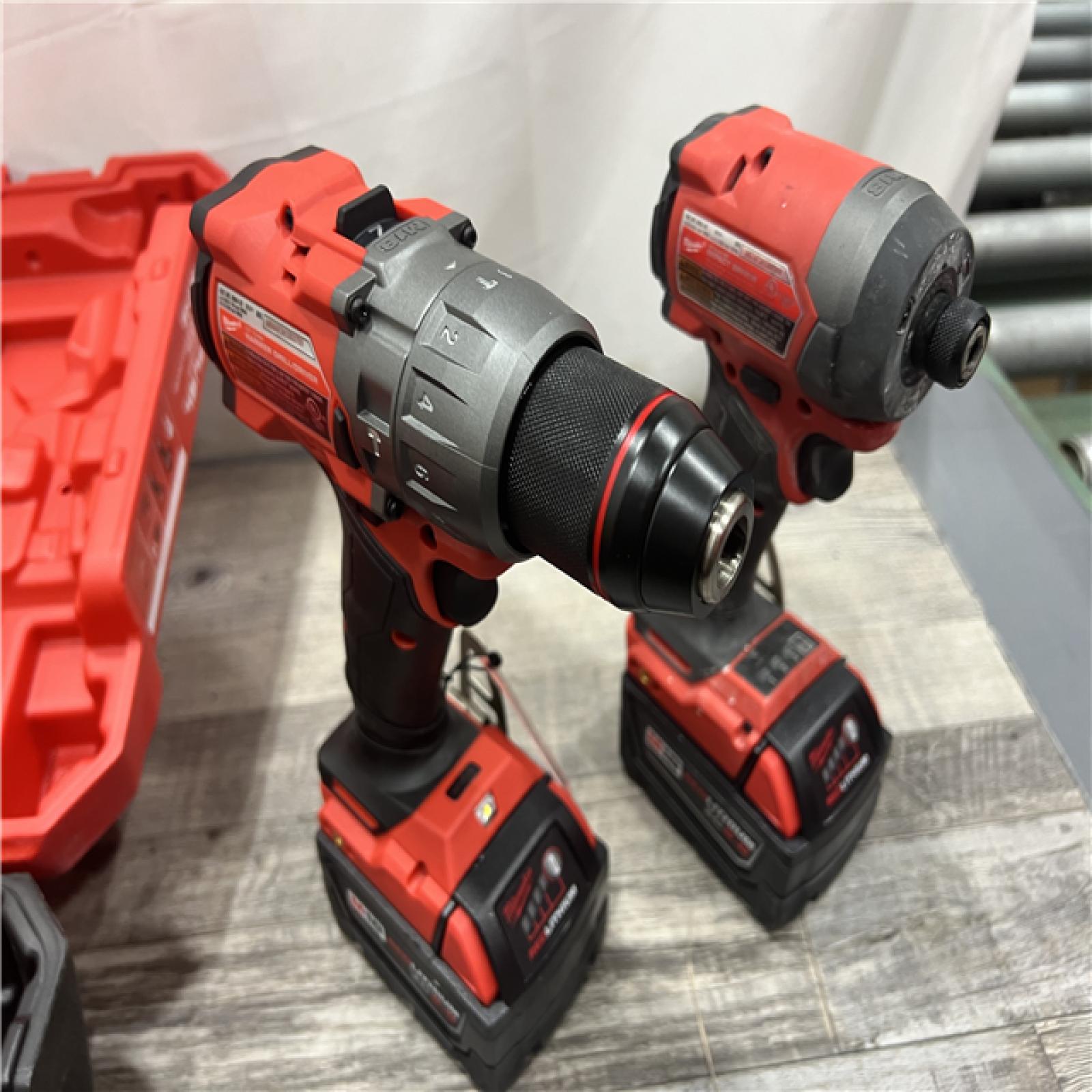 AS-IS MILWAUKEE M18 FUEL 18V Lithium-Ion Brushless Cordless Hammer Drill and Impact Driver Combo Kit (2-Tool) with 2 Batteries