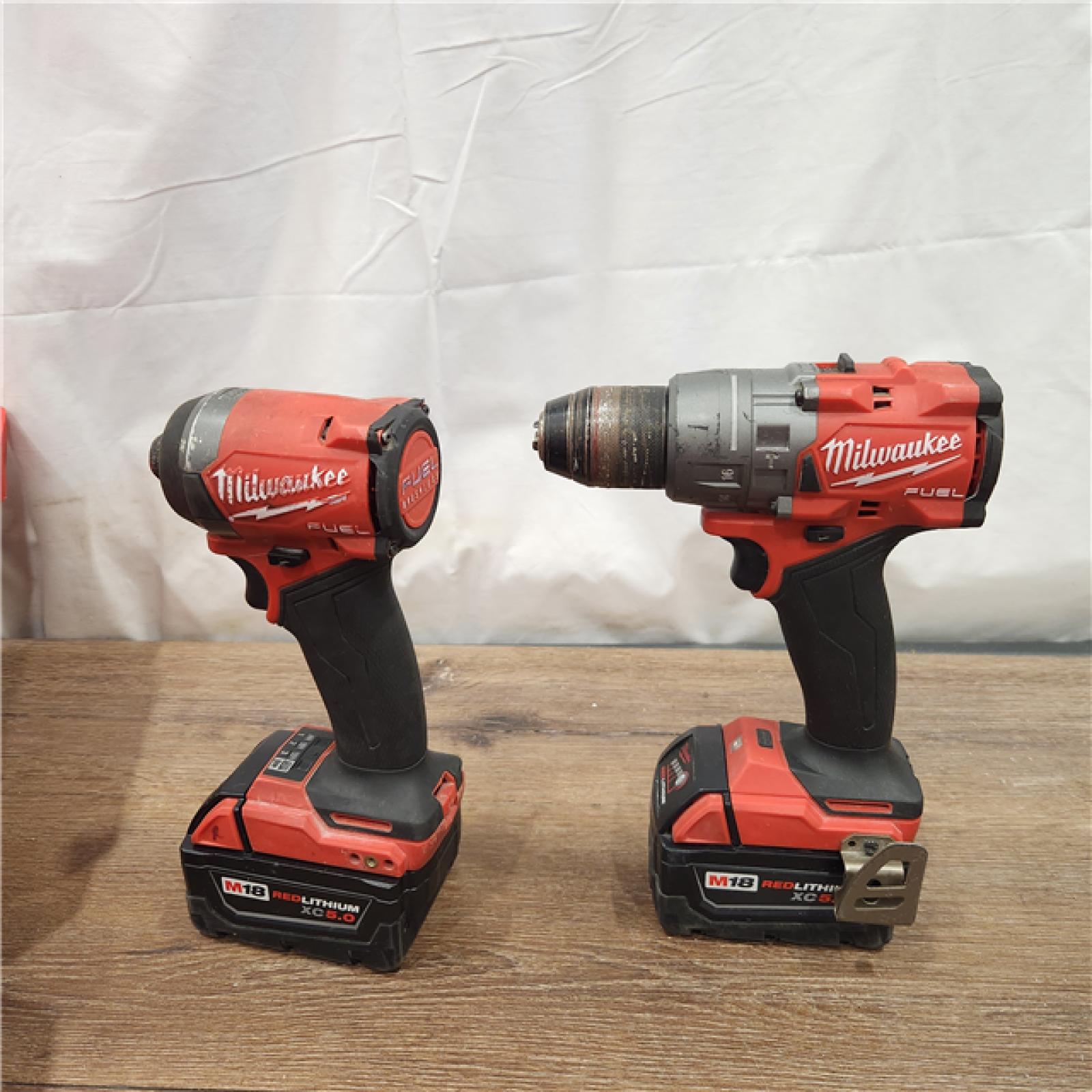 AS-IS Milwaukee M18 FUEL 18V Lithium-Ion Brushless Cordless Hammer Drill and Impact Driver Combo Kit (2-Tool) with 2 Batteries