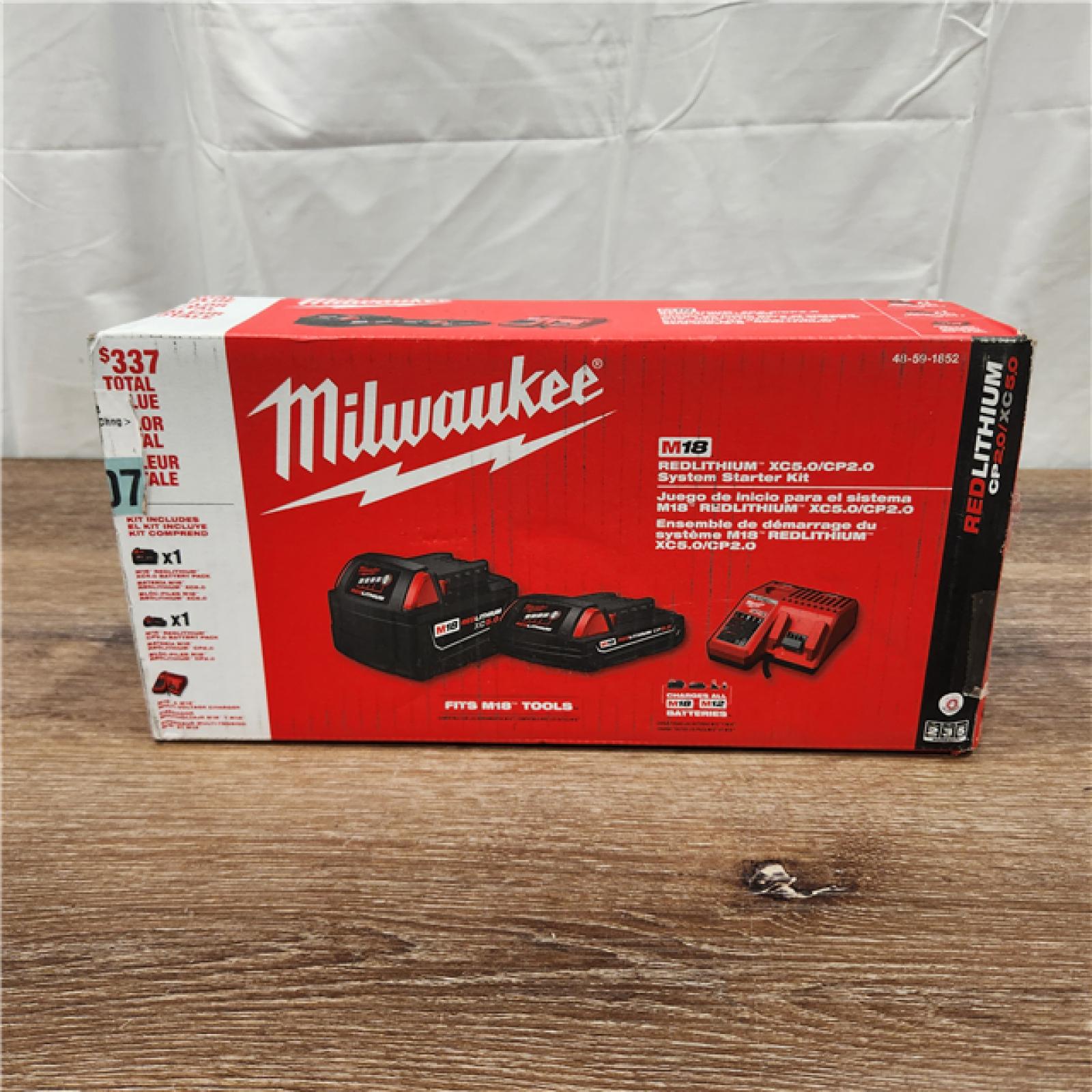 AS-IS Milwaukee M18 Redlithium Xc5.0 Resistant Battery Starter Kit