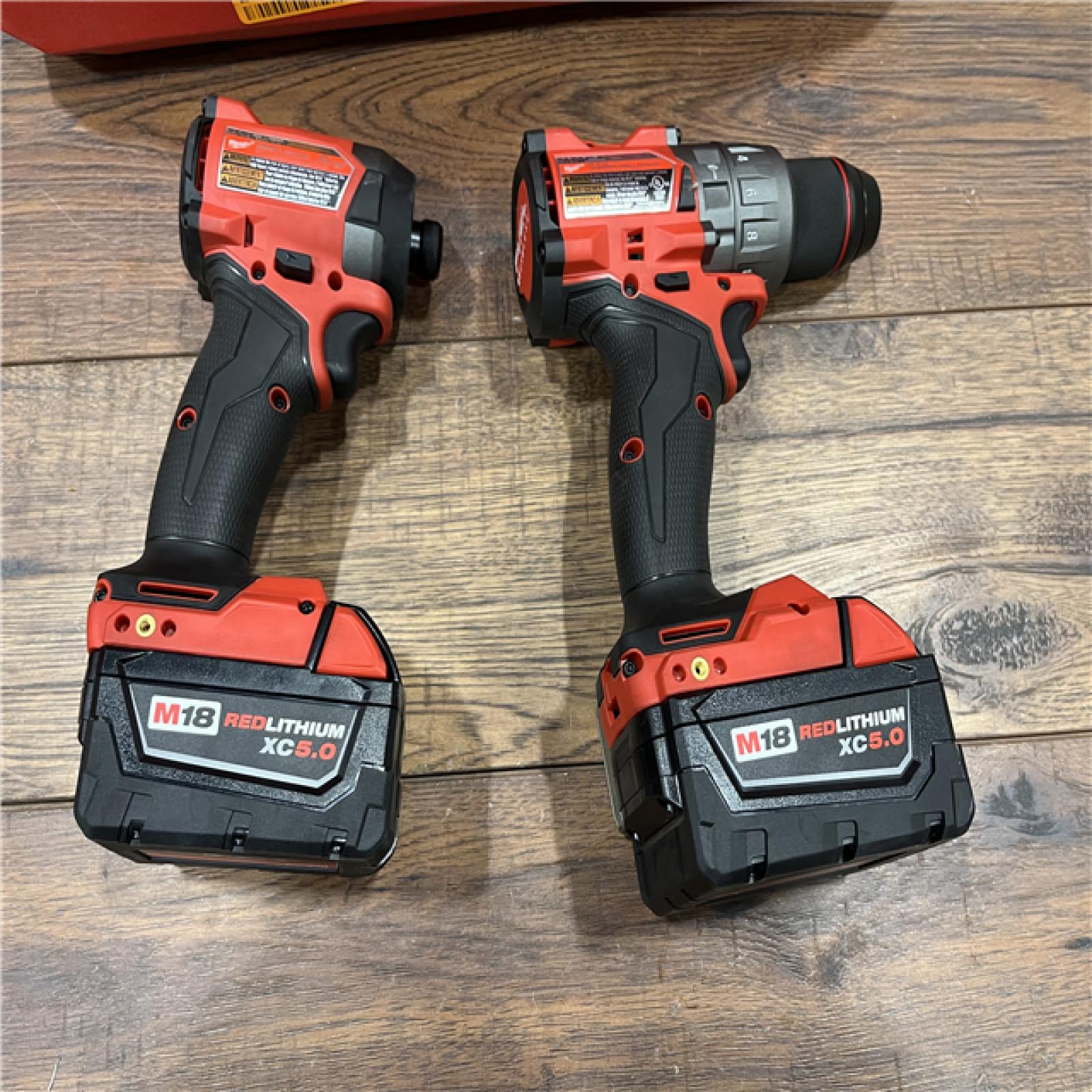 AS-IS Milwaukee M18 FUEL 18V Lithium-Ion Brushless Cordless Hammer Drill and Impact Driver Combo Kit (2-Tool) with 2 Batteries