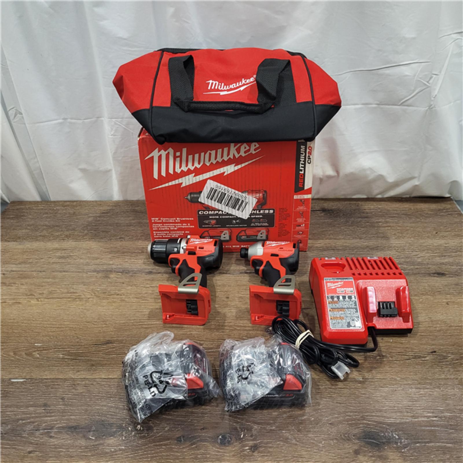 AS IS M18 18V Lithium-Ion Brushless Cordless Compact Drill/Impact Combo Kit (2-Tool) W/(2) 2.0 Ah Batteries, Charger & Bag