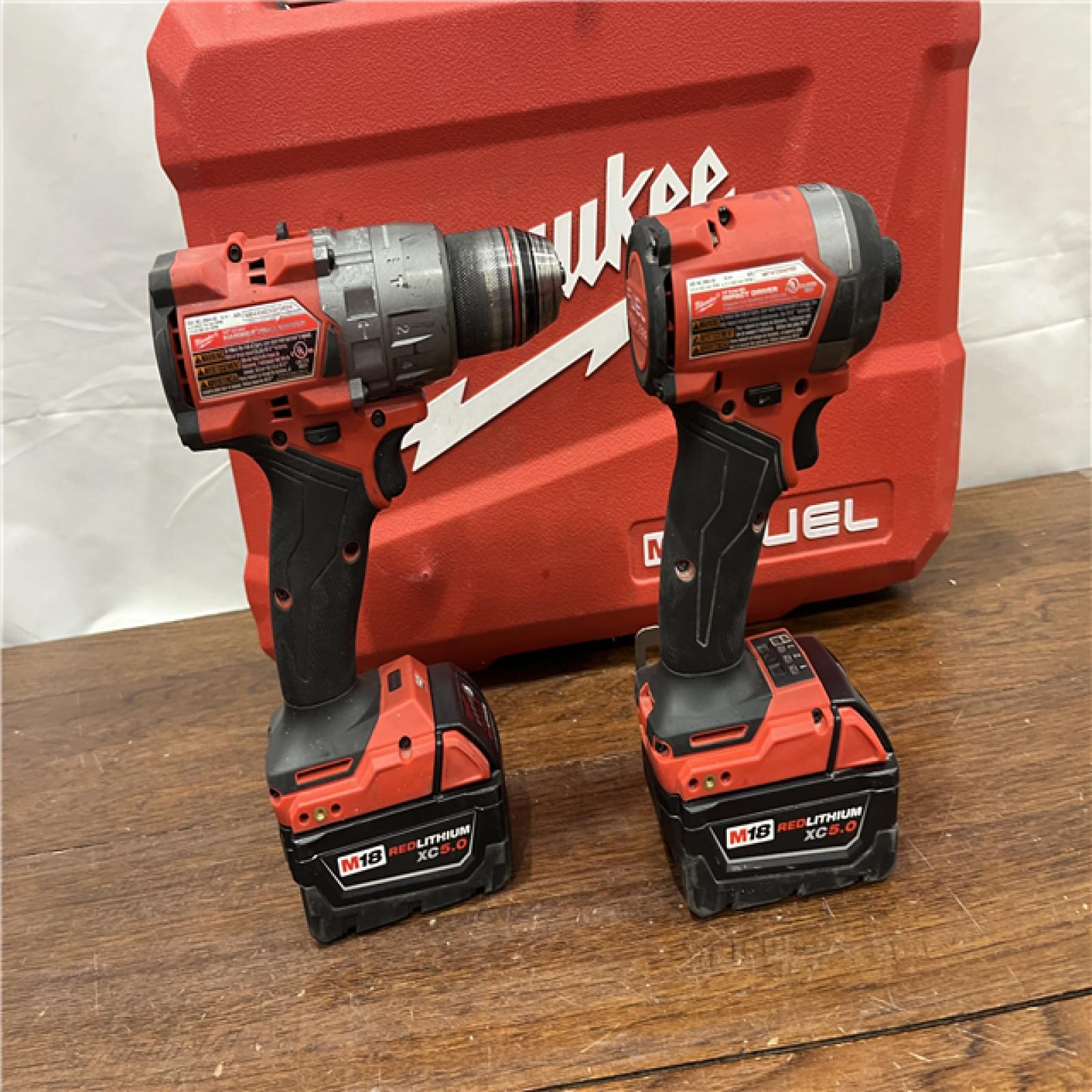 AS-IS Milwaukee M18 FUEL 18V Lithium-Ion Brushless Cordless Hammer Drill and Impact Driver Combo Kit (2-Tool) with 2 Batteries