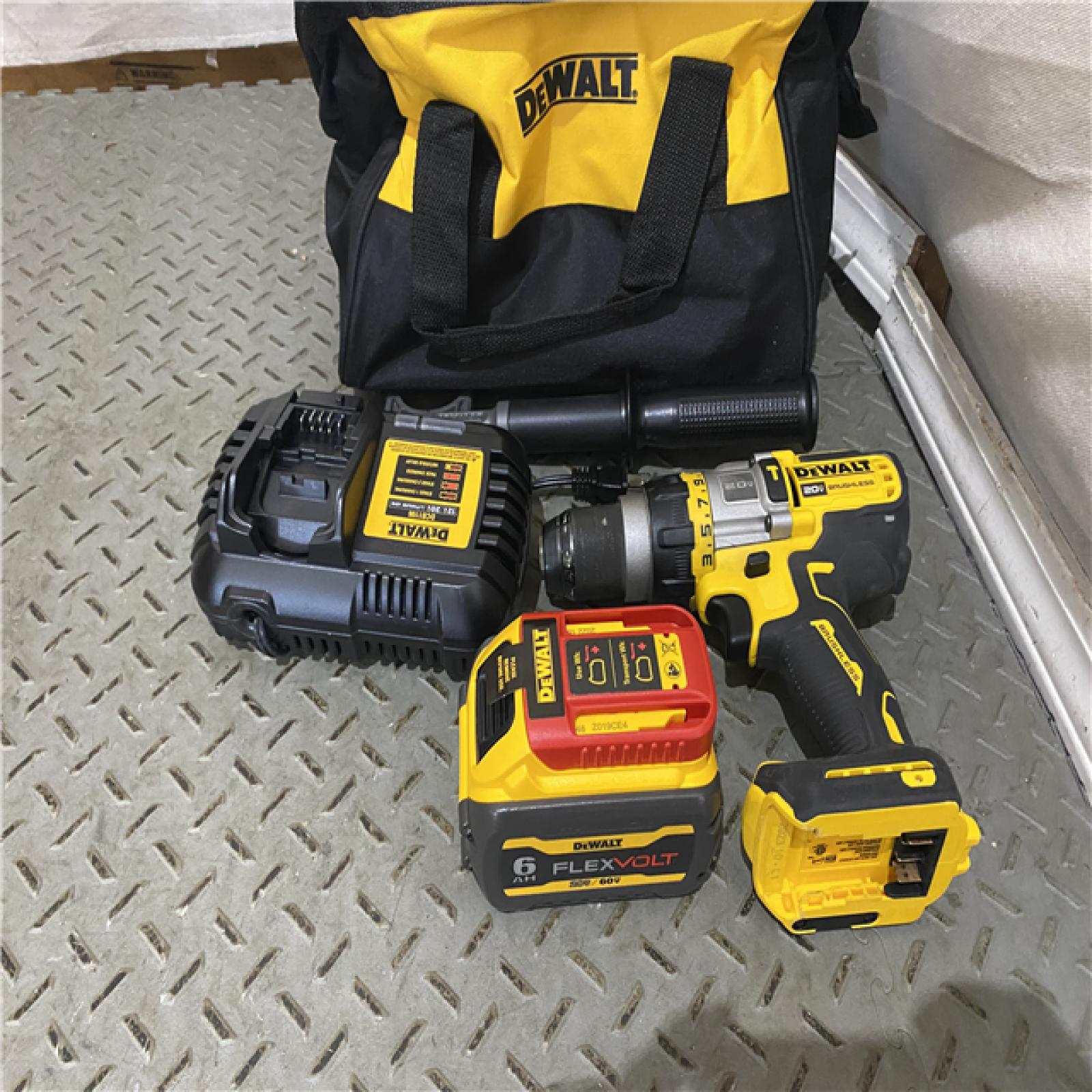 Houston location AS-IS Dewalt FLEXVOLT 20 Volt 1/2 in. Brushless Cordless Hammer Drill/Driver Kit (Battery & Charger)