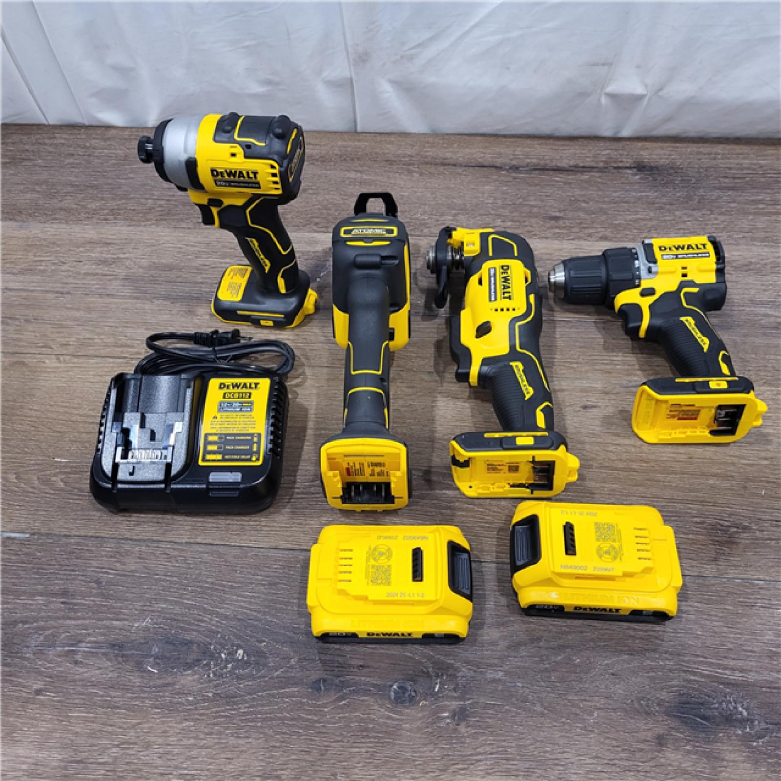 AS-IS DeWalt 20V MAX ATOMIC Cordless Brushless 4 Tool Combo Kit