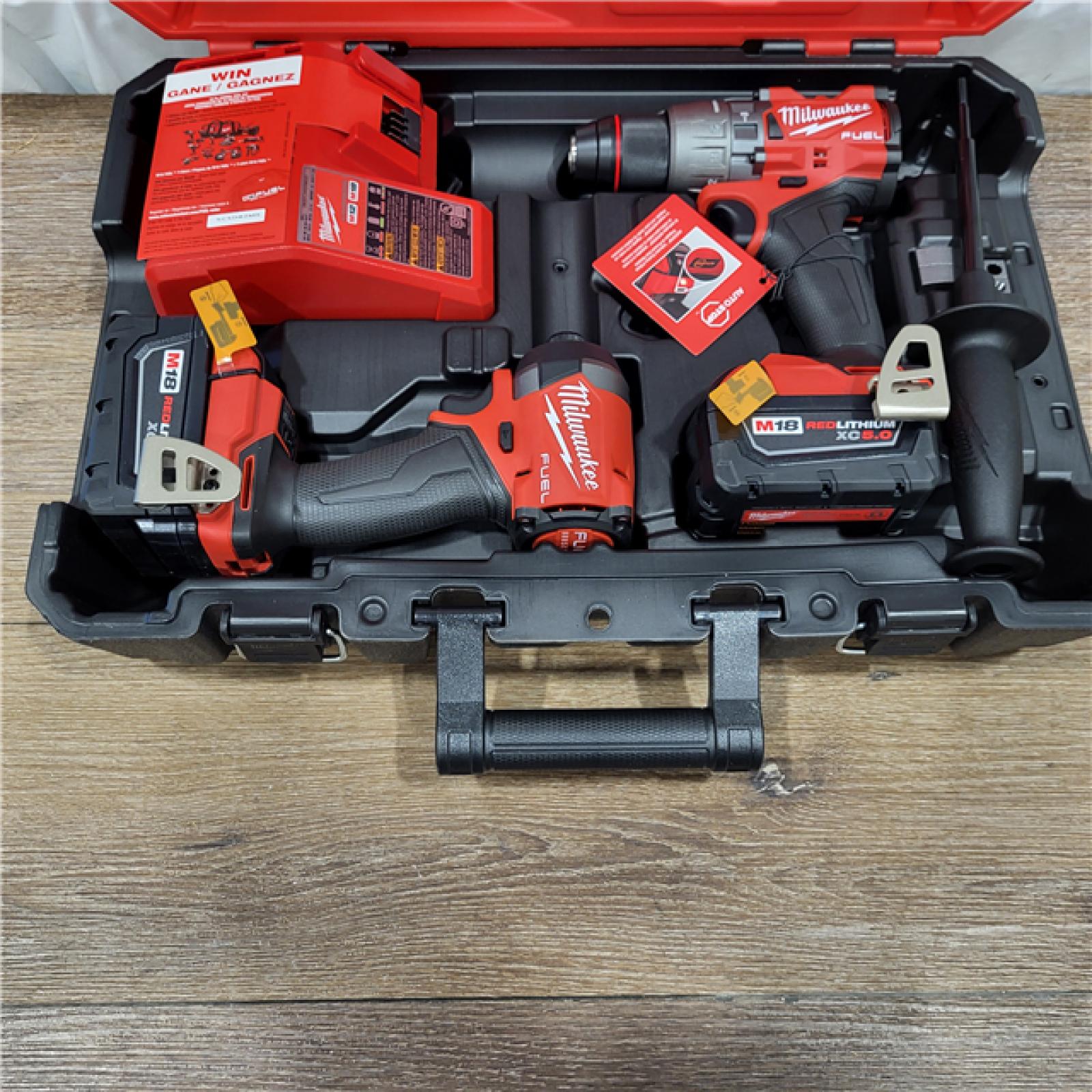 AS-IS M18 FUEL 18V Lithium-Ion Brushless Cordless Hammer Drill and Impact Driver Combo Kit (2-Tool) with 2 Batteries