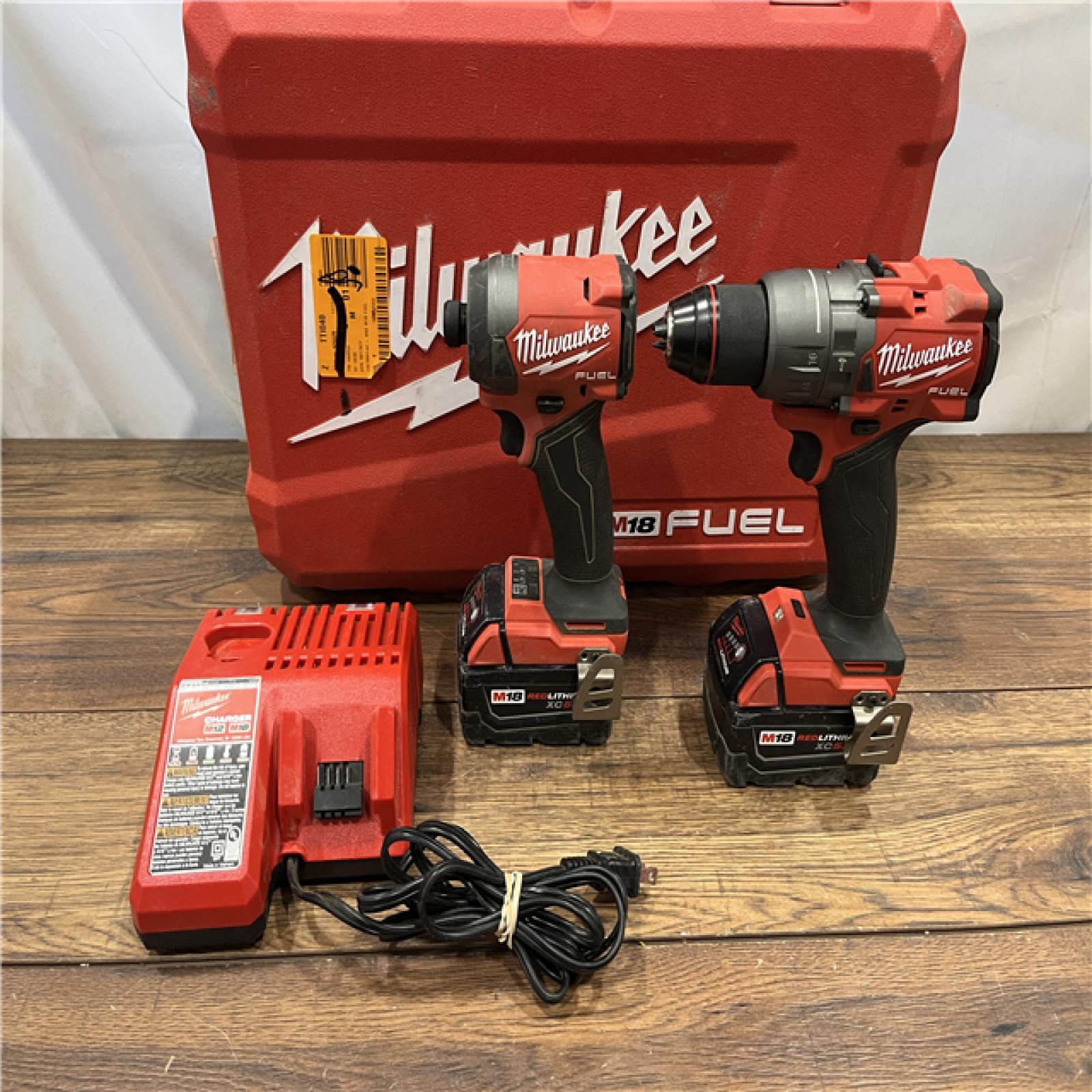 AS IS Milwaukee M18 FUEL 18V Lithium-Ion Brushless Cordless Hammer Drill and Impact Driver Combo Kit (2-Tool) with 2 Batteries