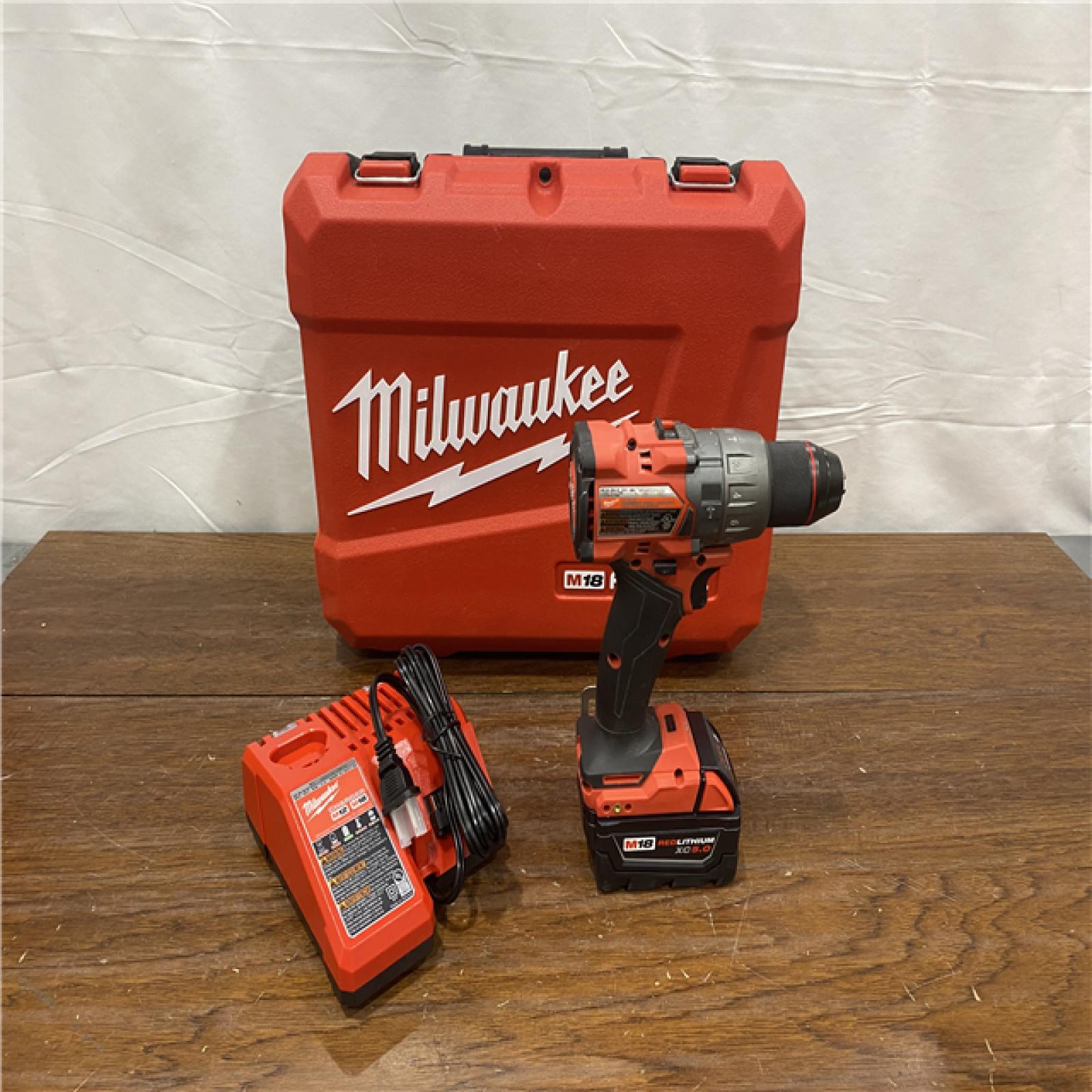 AS-IS Milwaukee 2904-22 Hammer Drill Driver Kit with Batteries  Charger & Tool Case  Red