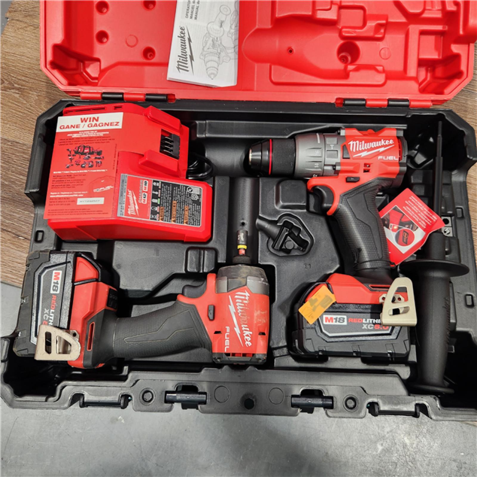 AS-IS Milwaukee M18 FUEL 18V Lithium-Ion Brushless Cordless Hammer Drill and Impact Driver Combo Kit (2-Tool) with 2 Batteries