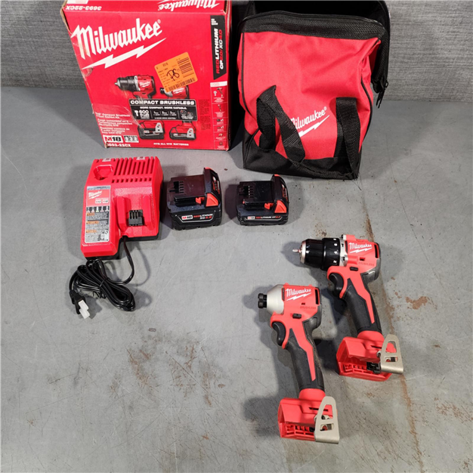 HOUSTON LOCATION - AS-IS M18 18-Volt Lithium-Ion Brushless Cordless Compact Hammer Drill/Impact Combo Kit (2-Tool) with (2) Batteries, Bag