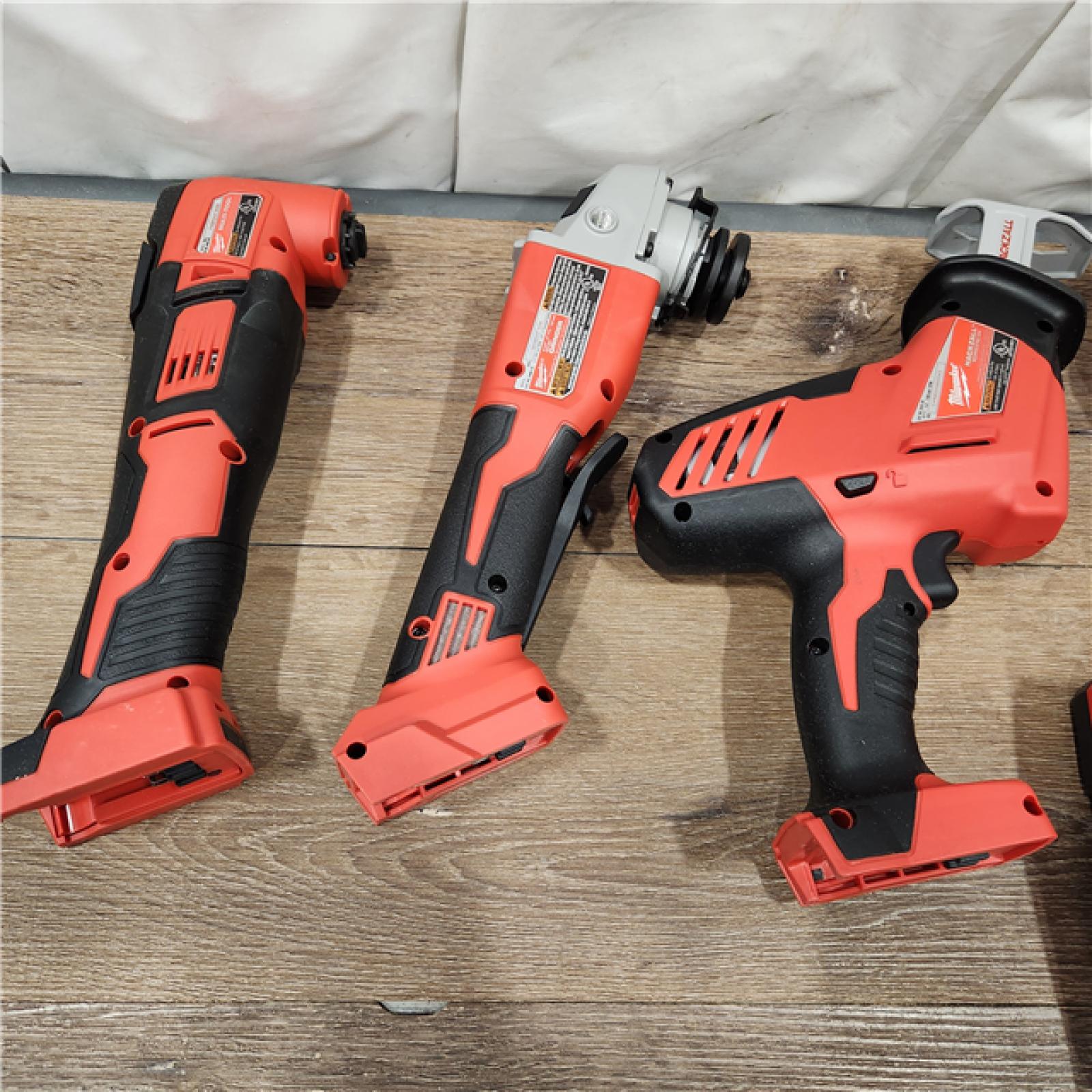 AS-IS Milwaukee M18 18-Volt Lithium-Ion Cordless Combo Kit 7-Tool with 2-Batteries, Charger and Tool Bag