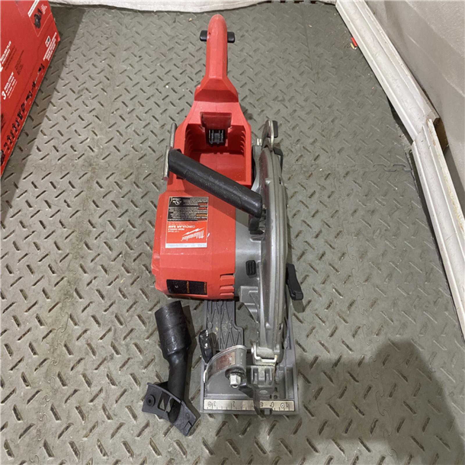 Houston location AS-IS  Milwaukee 2830-20 Rear Handle Circular Saw M18 FUEL 7-1/4  Cordless Brushless Tool Only