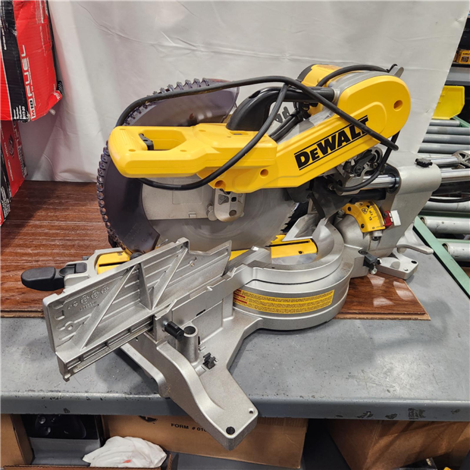 AS-IS DEWALT 15 Amp Corded 12 in. Double Bevel Sliding Compound Miter Saw with XPS Technology, Blade Wrench and Material Clamp