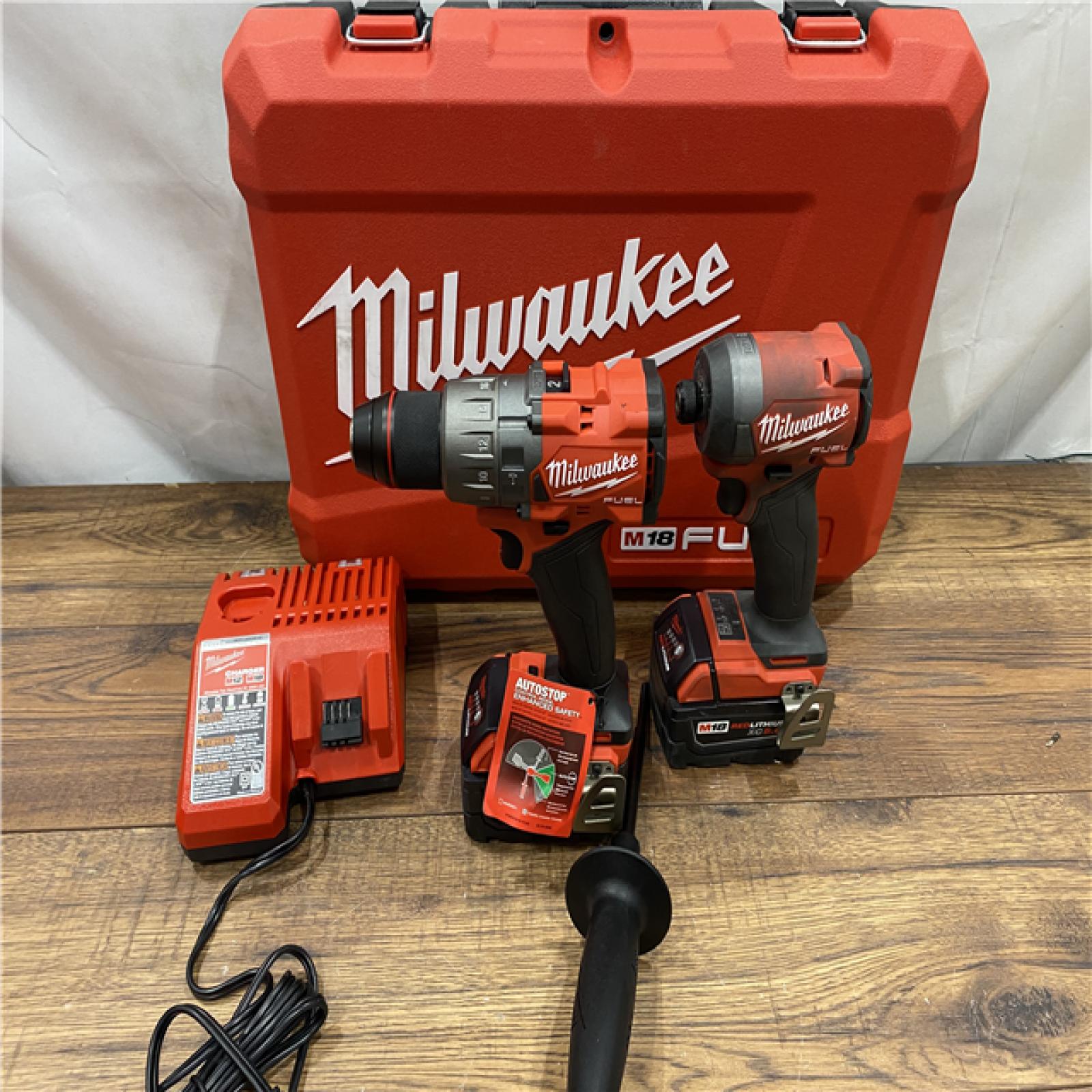 AS IS Milwaukee M18 FUEL 18V Lithium-Ion Brushless Cordless Hammer Drill and Impact Driver Combo Kit (2-Tool) with 2 Batteries