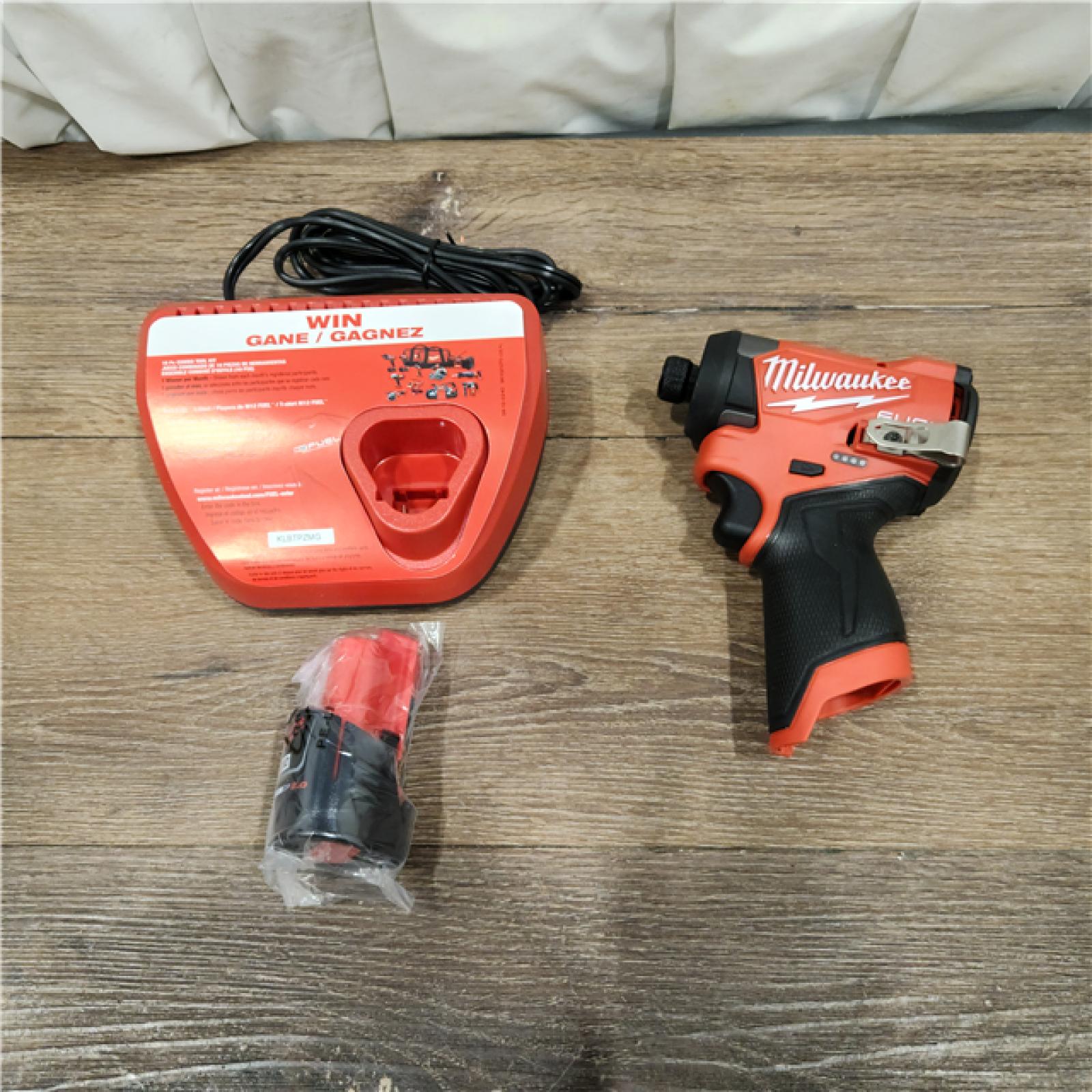 AS-IS Milwaukee M12 FUEL 12-Volt Lithium-Ion Brushless Cordless 1/4 in. Hex Impact Driver Compact Kit