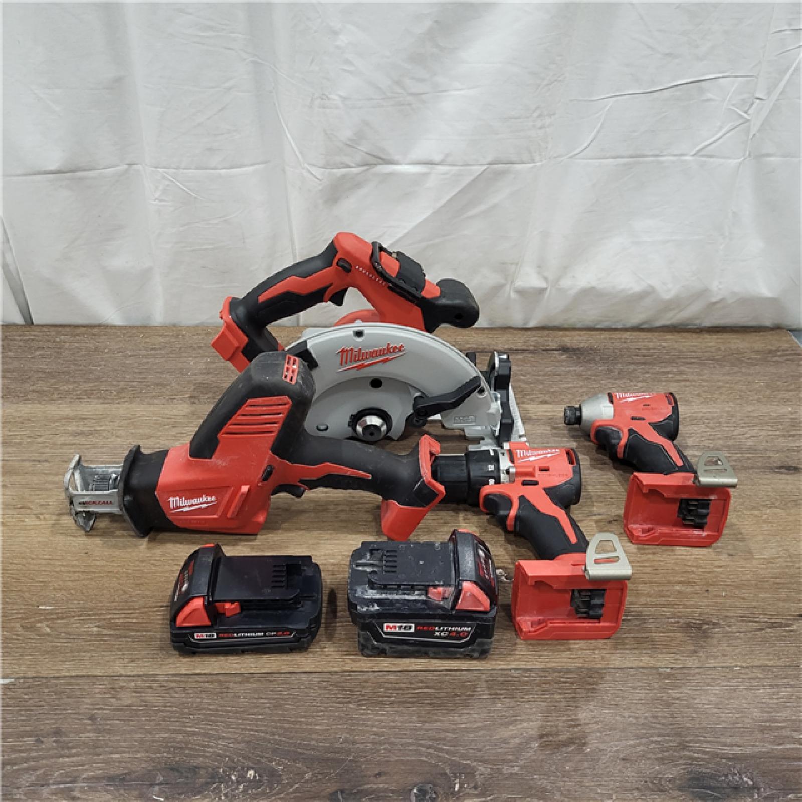 AS-IS M18 18-Volt Lithium-Ion Brushless Cordless Combo Kit (4-Tool) with 2-Batteries, 1-Charger and Tool Bag