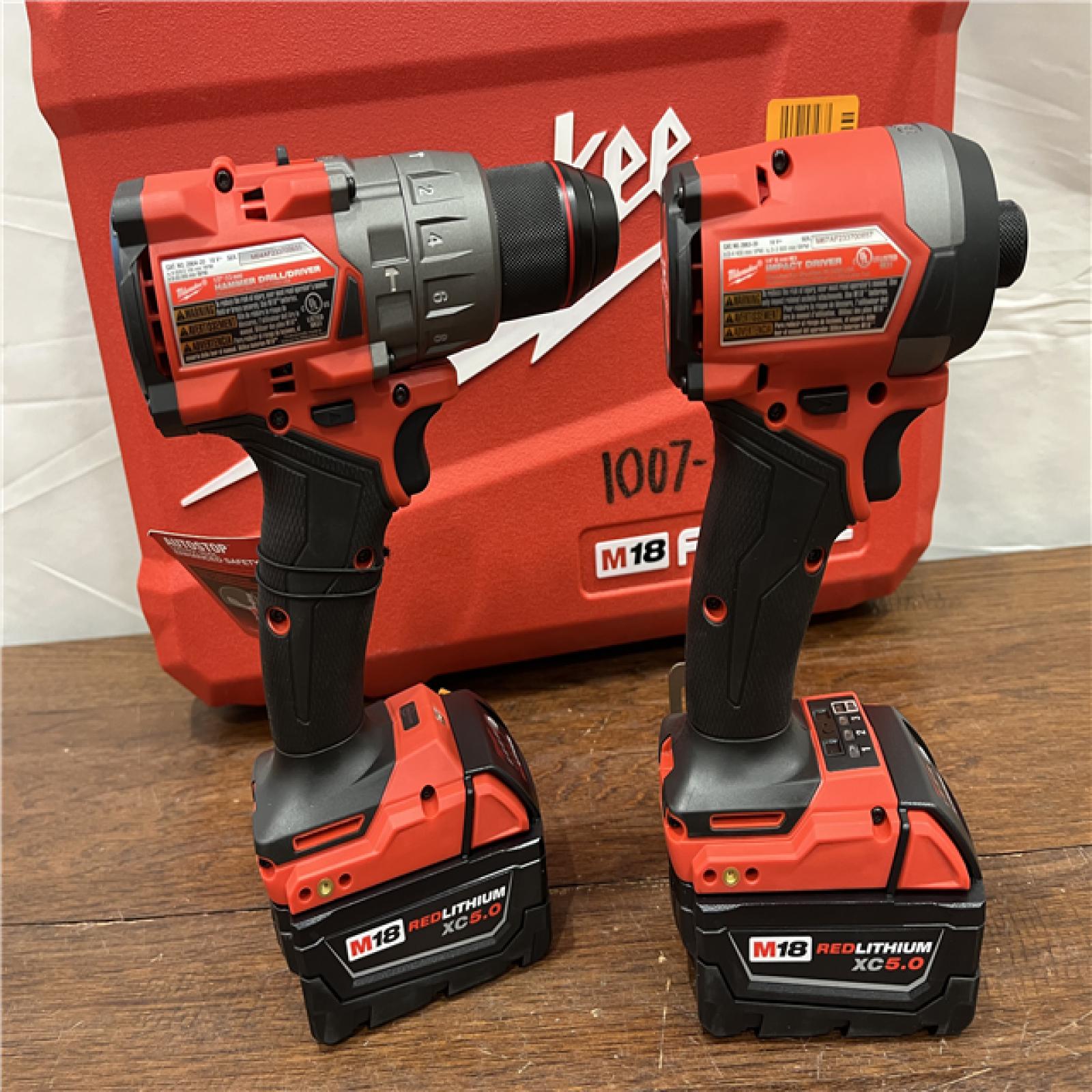 AS-ISMilwaukee M18 FUEL 18V Lithium-Ion Brushless Cordless Hammer Drill and Impact Driver Combo Kit (2-Tool) with 2 Batteries