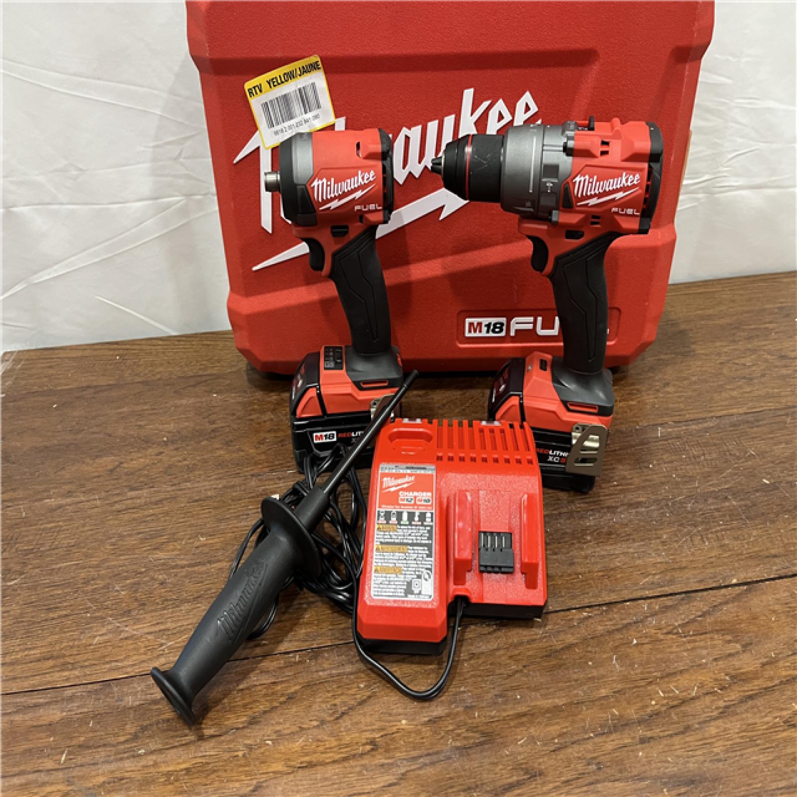 AS-IS Milwaukee M18 FUEL 18V Lithium-Ion Brushless Cordless Hammer Drill and Impact Driver Combo Kit (2-Tool) with 2 Batteries