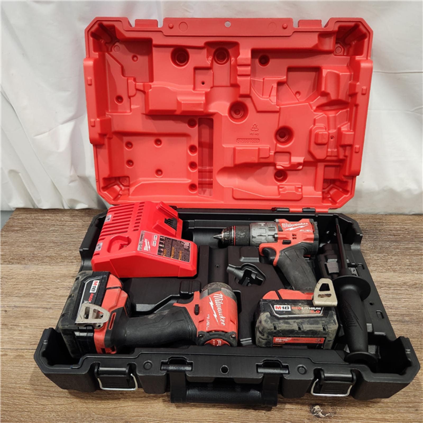 AS-IS M18 FUEL 18V Lithium-Ion Brushless Cordless Hammer Drill and Impact Driver Combo Kit (2-Tool) with 2 Batteries