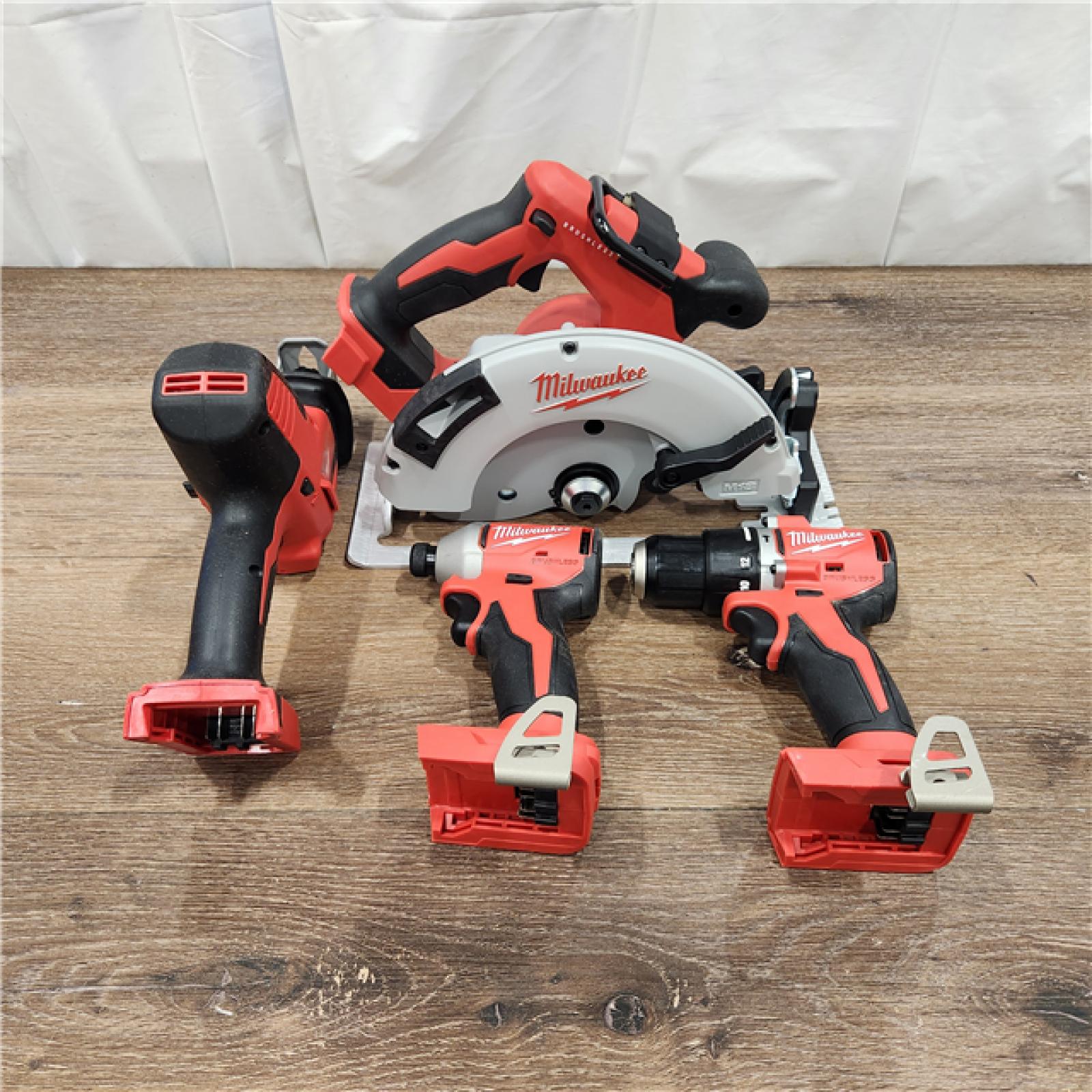 AS-IS M18 18-Volt Lithium-Ion Brushless Cordless Combo Kit (4-Tool) with 2-Batteries, 1-Charger and Tool Bag