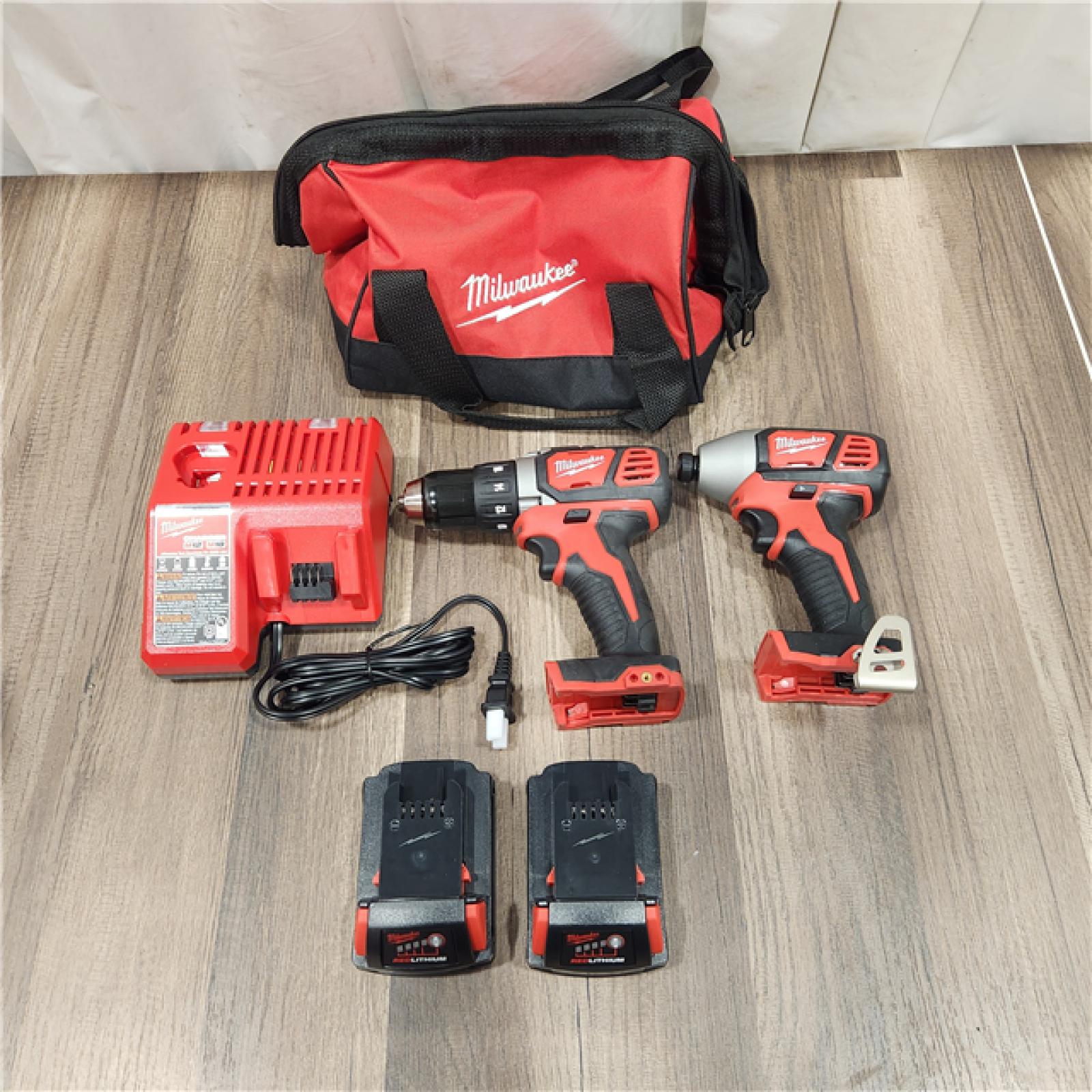 AS IS Milwaukee M18 18V Cordless Brushed 2 Tool Drill/Driver and Impact Driver Kit