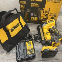 AS-IS DEWALT ATOMIC 20V MAX Lithium Ion Cordless 23 Gauge Pin Nailer Kit with 2.0Ah Battery and Charger