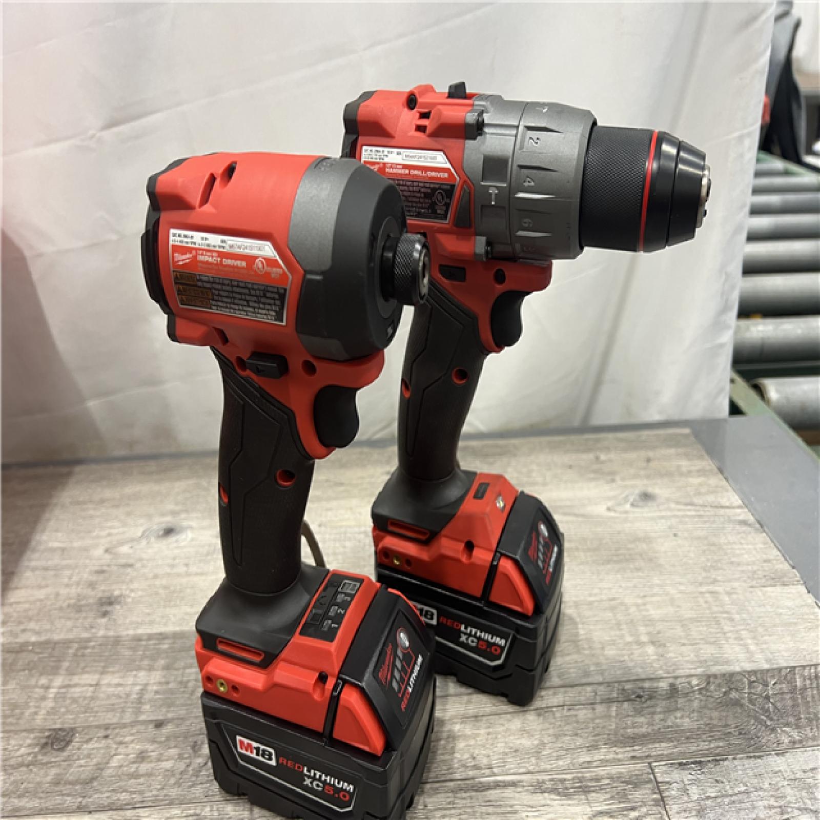 AS-IS MILWAUKEE M18 FUEL 18V Lithium-Ion Brushless Cordless Hammer Drill and Impact Driver Combo Kit (2-Tool) with 2 Batteries