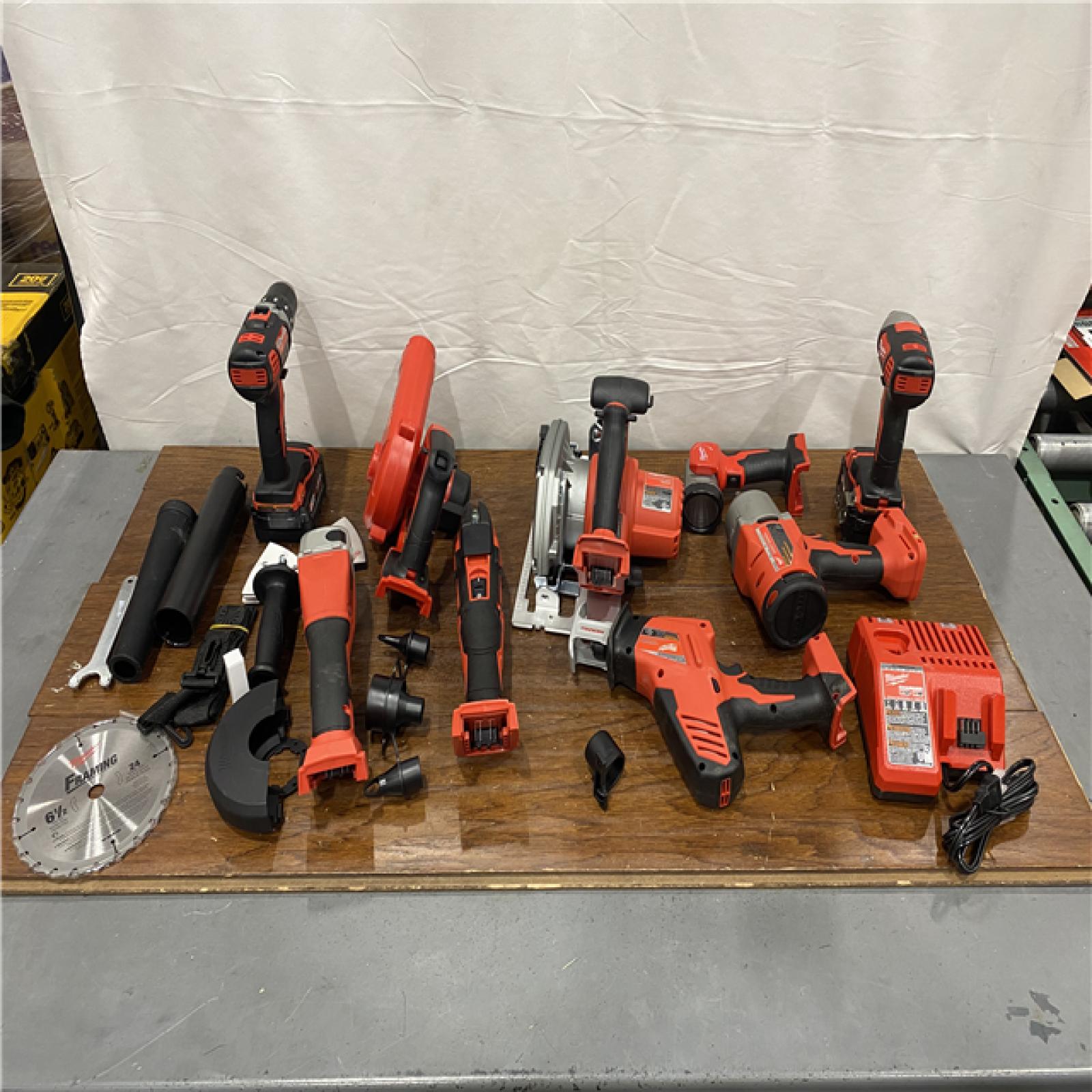 AS-IS M18 18-Volt Lithium-Ion Cordless Combo Kit (9-Tool) with (2) Batteries, Charger, and Tool Bag