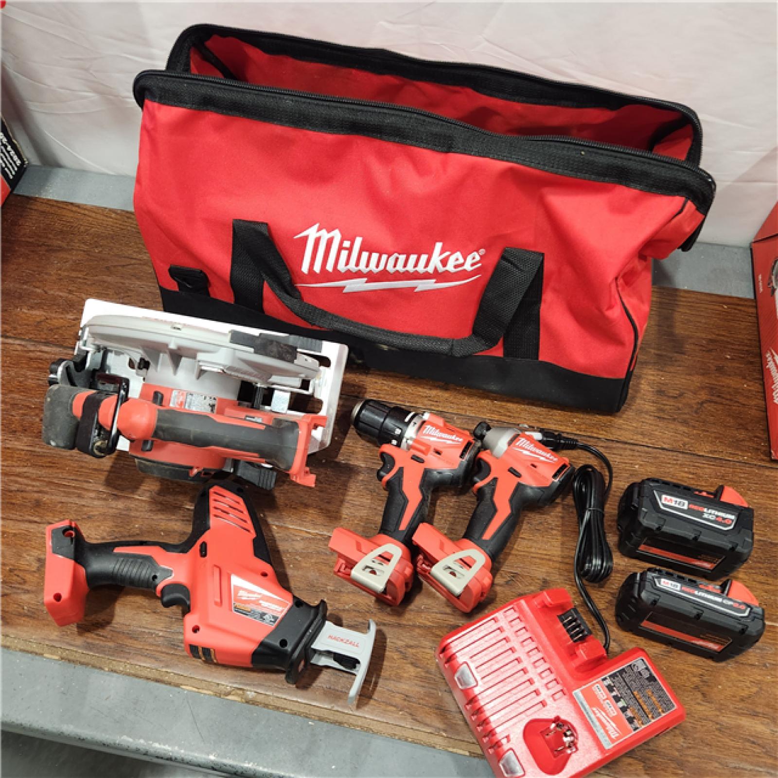 AS-IS M18 18-Volt Lithium-Ion Brushless Cordless Combo Kit (4-Tool) with 2-Batteries, 1-Charger and Tool Bag