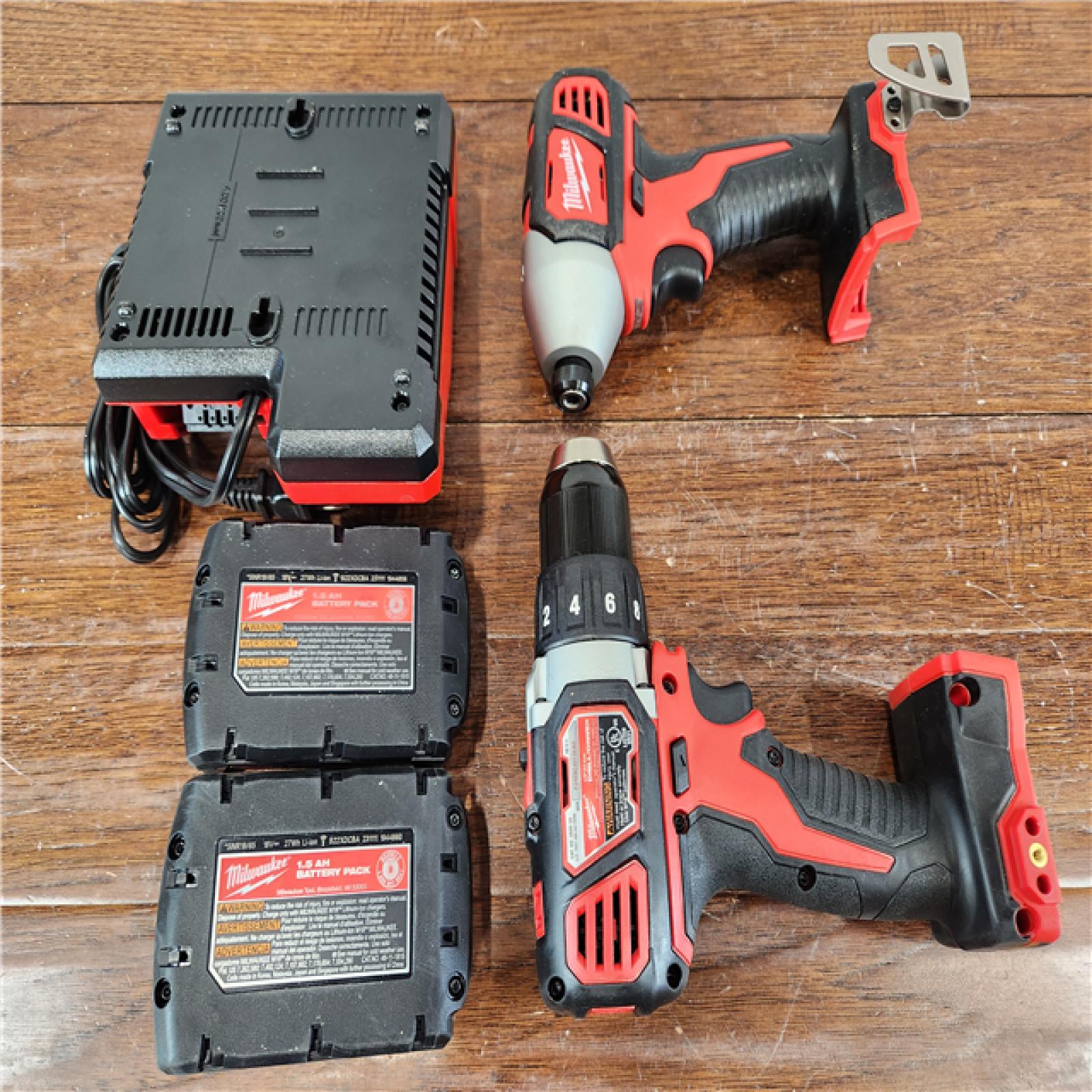 AS-IS Milwaukee M18 Brushed Cordless (2-Tool) Drill/Driver and Impact Driver Kit