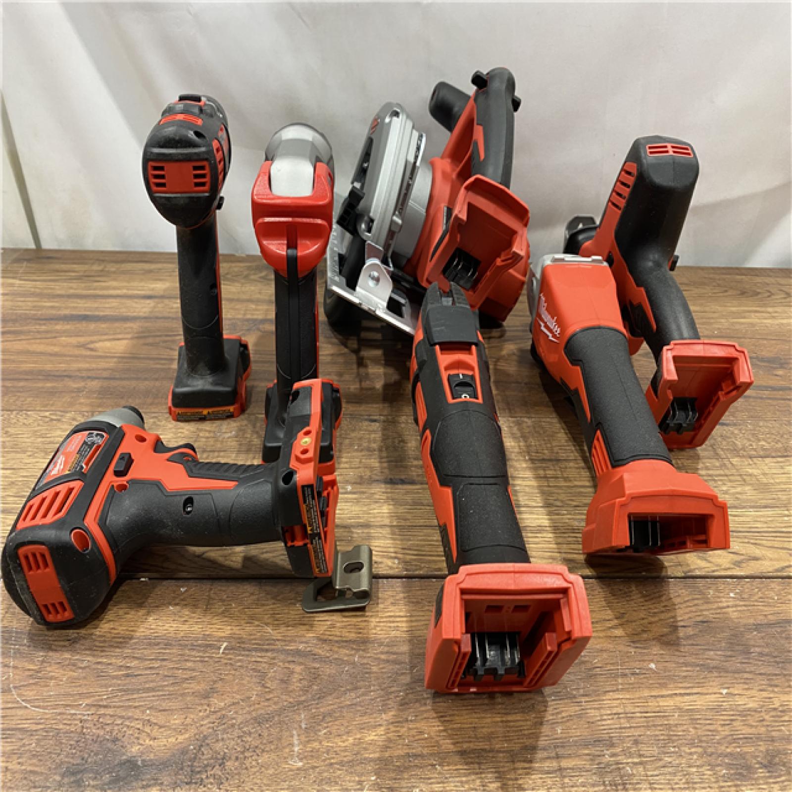 AS IS Milwaukee M18 18-Volt Lithium-Ion Cordless Combo Kit 7-Tool with 2-Batteries, Charger and Tool Bag