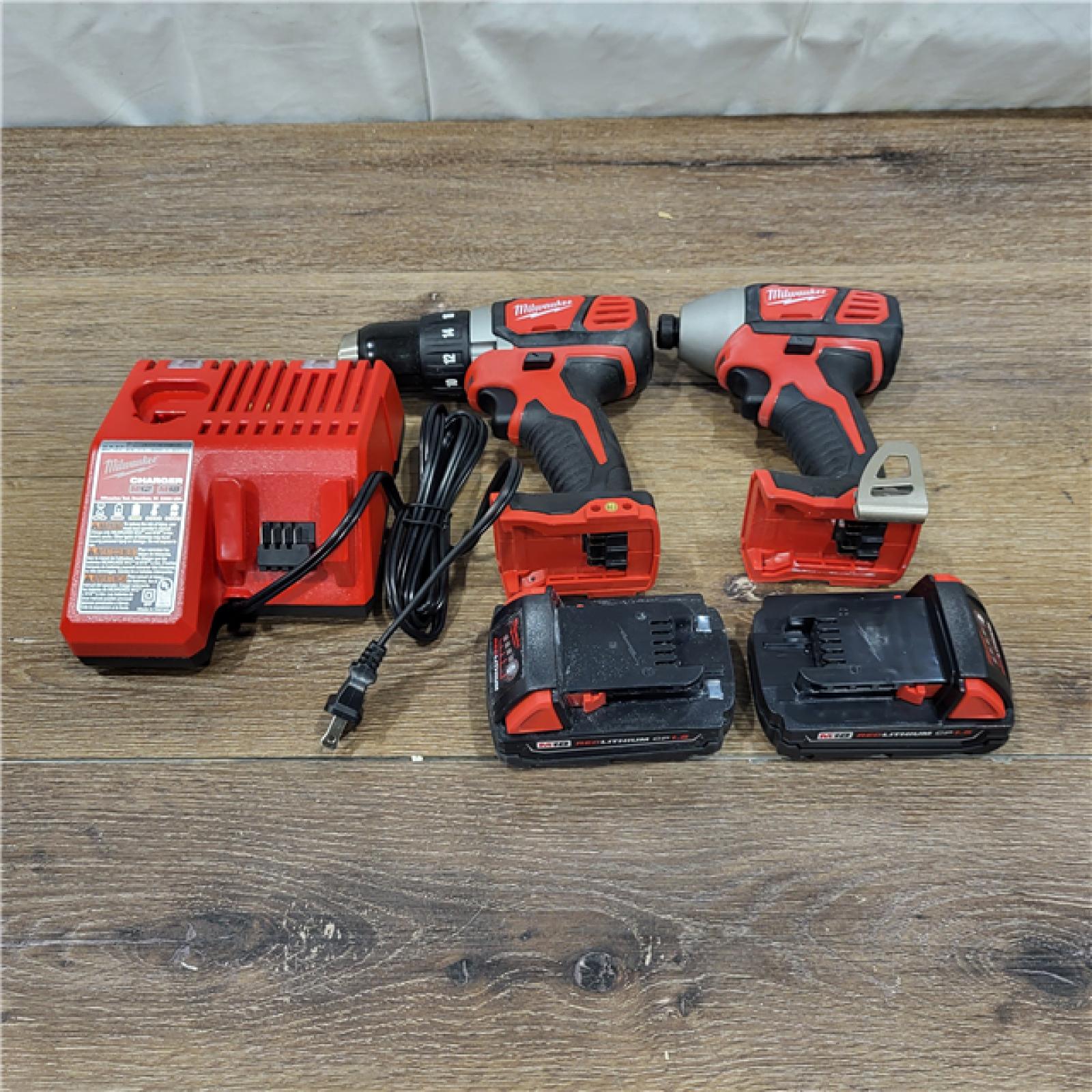 AS-IS Milwaukee M18 Brushed Cordless (2-Tool) Drill/Driver and Impact Driver Kit