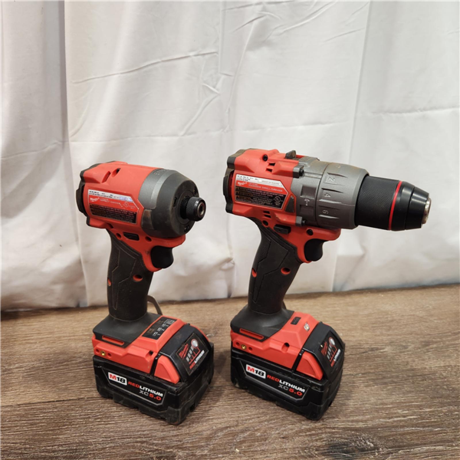 AS-IS Milwaukee M18 FUEL 18V Lithium-Ion Brushless Cordless Hammer Drill and Impact Driver Combo Kit (2-Tool) with 2 Batteries