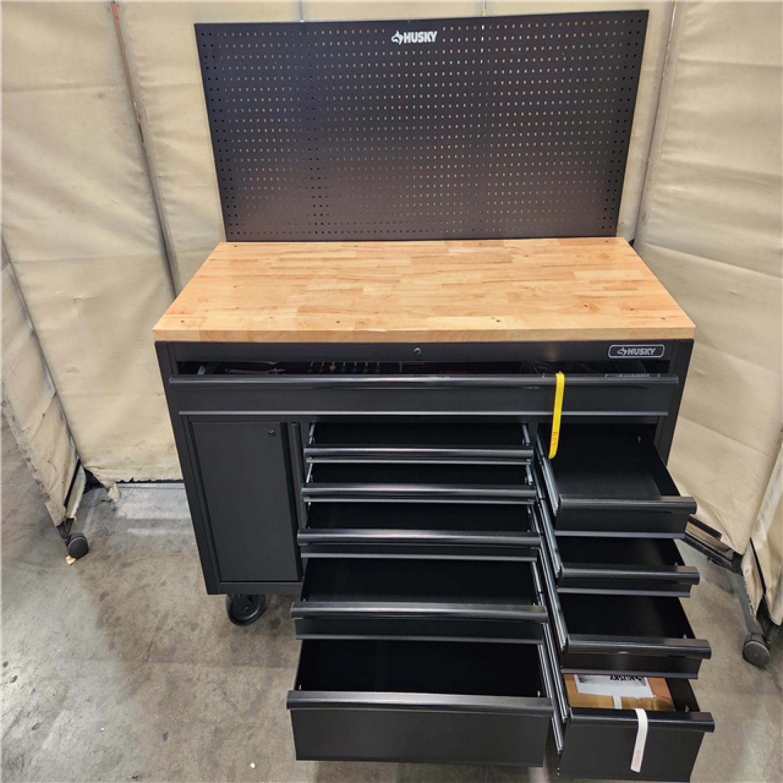 California AS-IS Husky 61 IN.10 Drawer 1 Door 24 IN. D MOBILE WORKBENCH WITH PEGBOARD AND SHELF