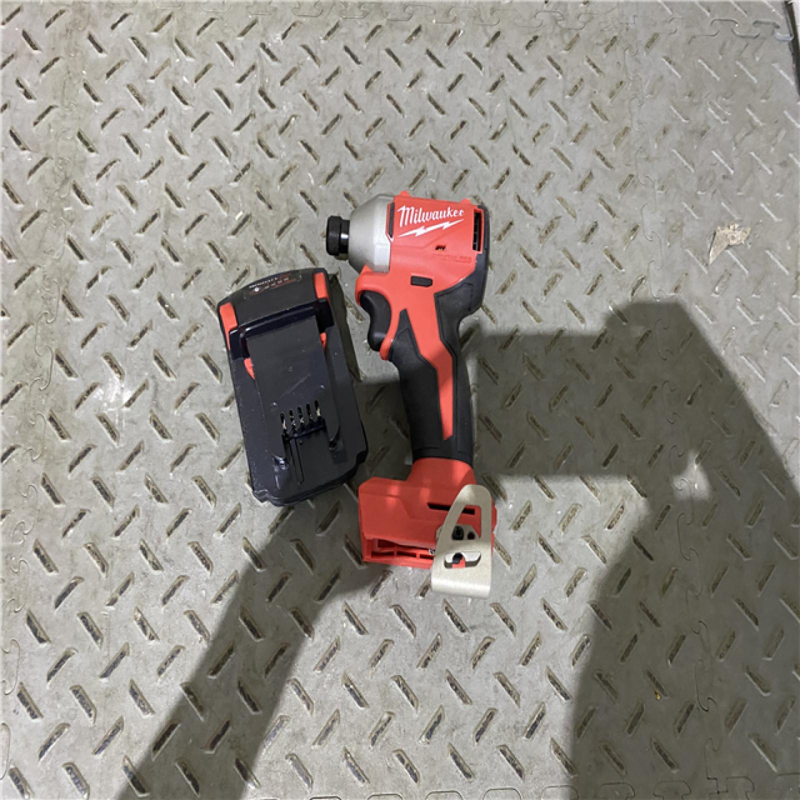 Houston location AS-IS Milwaukee M18 Compact Brushless 1/4  Hex Impact Driver Kit