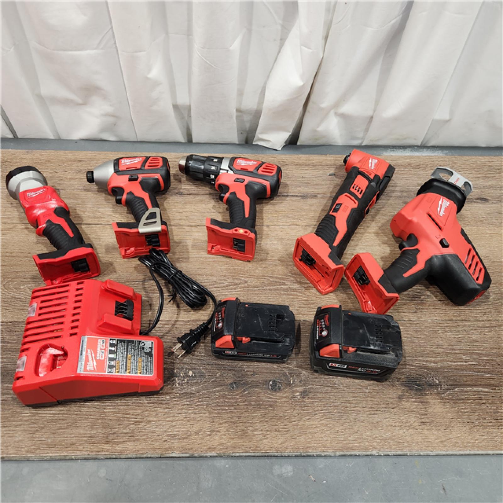 AS-IS M18 18V Lithium-Ion Cordless Combo Kit (5-Tool) with (2) Batteries, Charger and Tool Bag