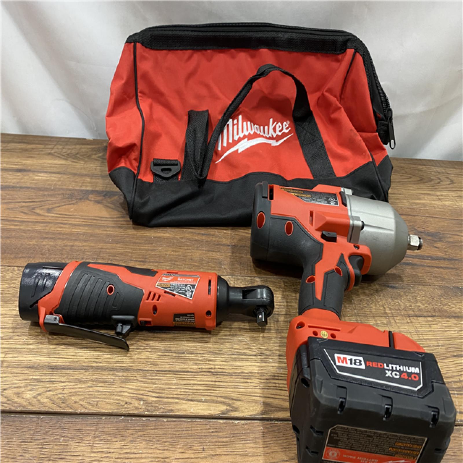 AS IS M12/M18 12/18V Lithium-Ion Cordless 3/8 in. Ratchet and 1/2 in. High Torque Impact Wrench with Friction Ring Combo Kit