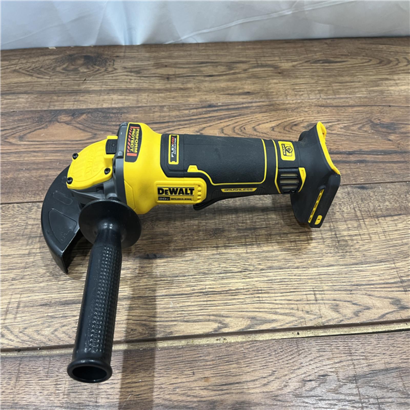 AS-IS DEWALT 20V MAX Cordless Brushless 4.5 - 5 in. Paddle Switch Angle Grinder with FLEXVOLT ADVANTAGE (Tool Only)