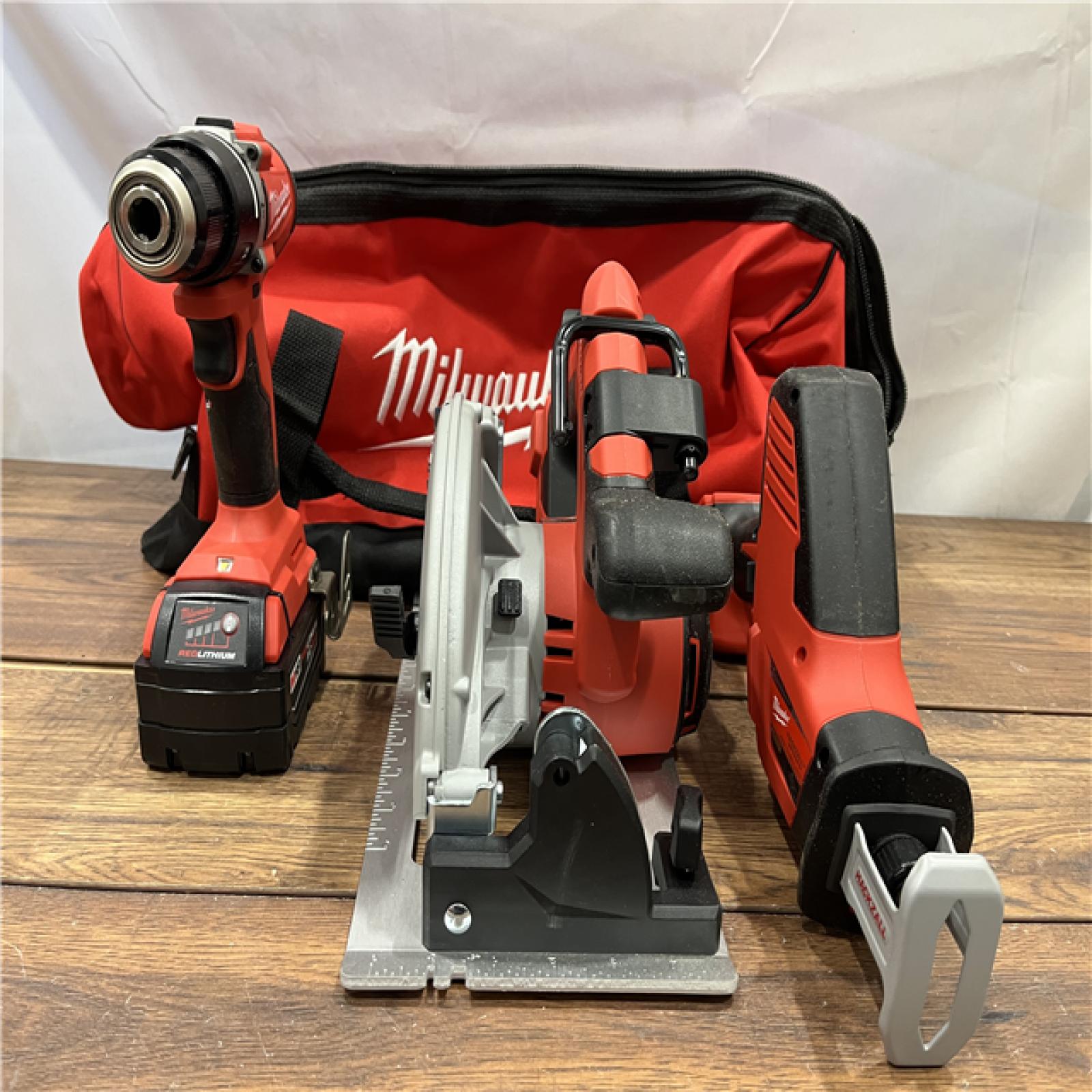 AS IS Milwaukee M18 18-Volt Lithium-Ion Brushless Cordless Combo Kit (4-Tool) with 2-Batteries, 1-Charger and Tool Bag