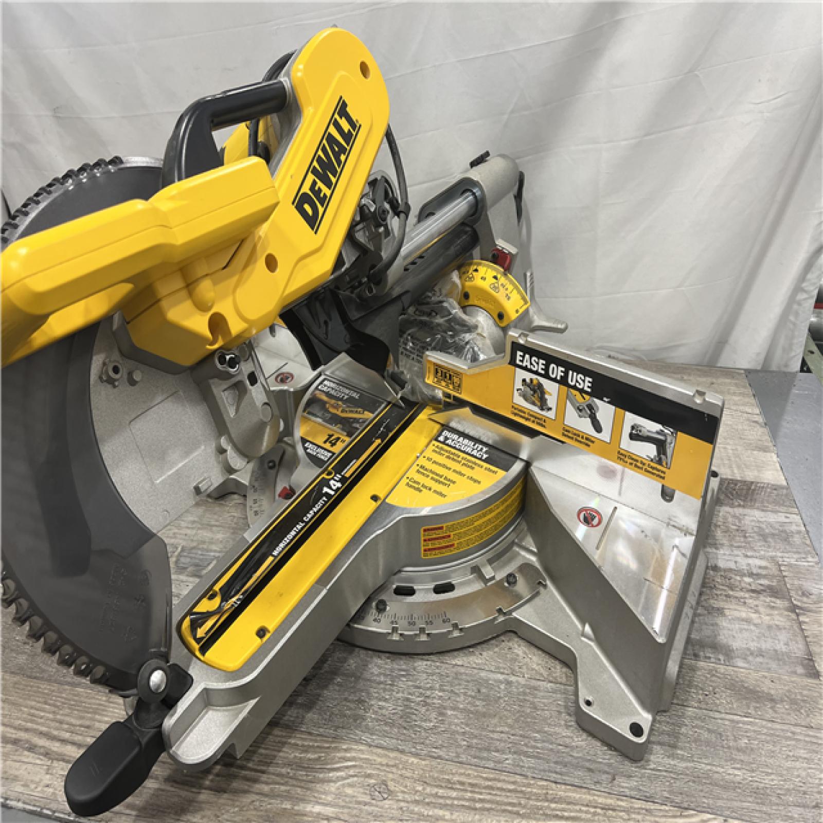 AS-IS DEWALT 15 Amp Corded 12 in. Double Bevel Sliding Compound Miter Saw with XPS Technology, Blade Wrench and Material Clamp