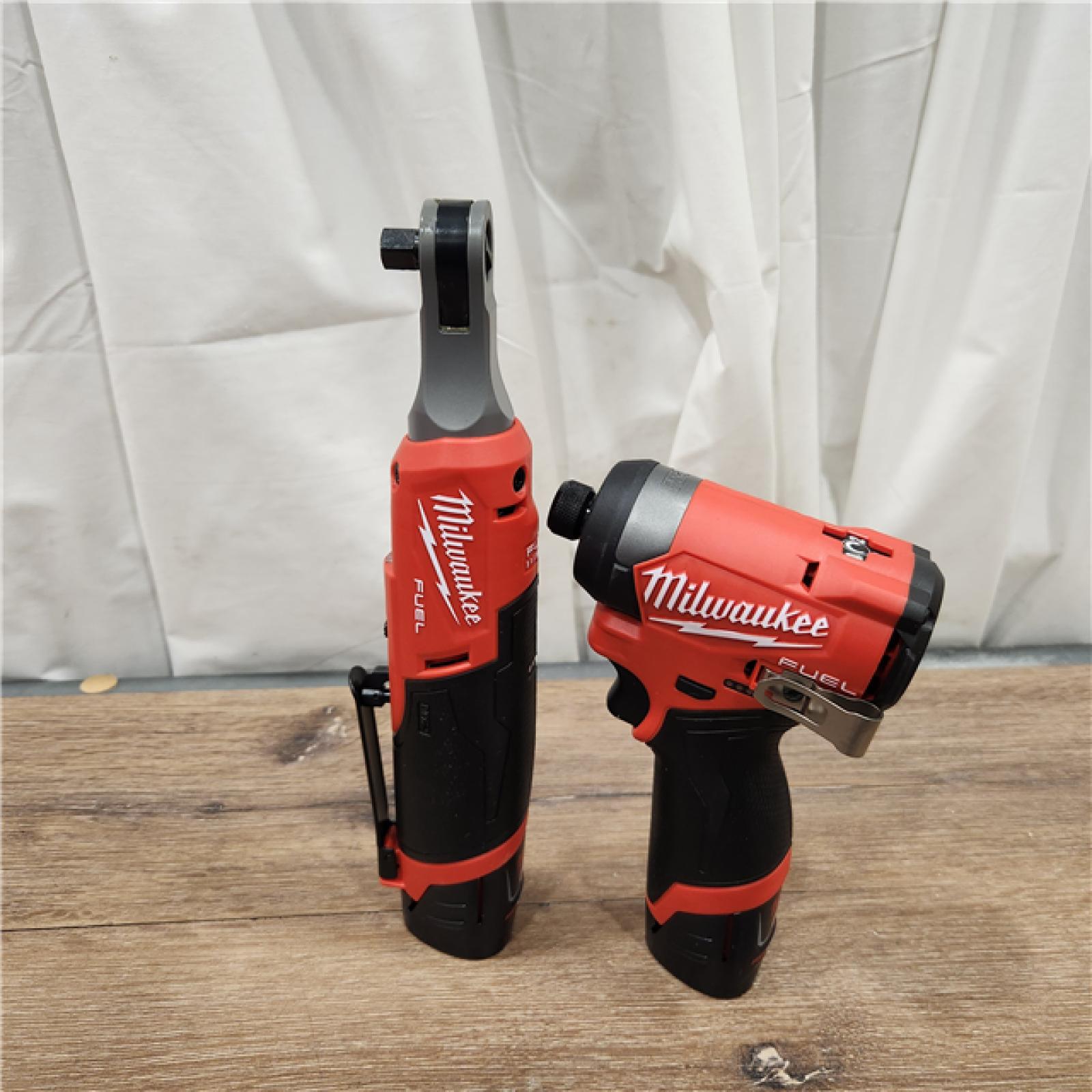 AS-IS Milwaukee 3453-22HSR M12 FUEL 12V Lithium-Ion Cordless 3/8 in. Ratchet and 1/4 in. Impact Driver Kit